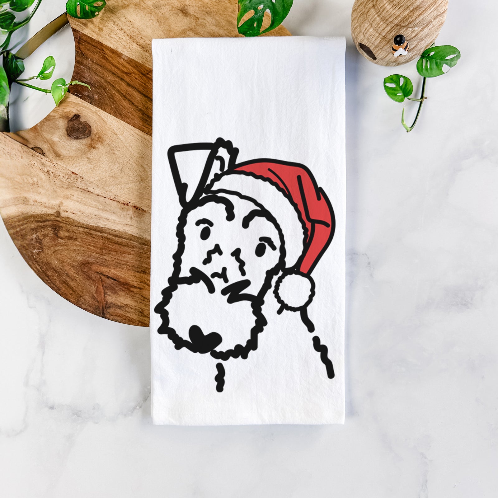Minimalist line drawing of a Wire Fox Terrier wearing a Santa hat on a tea towel