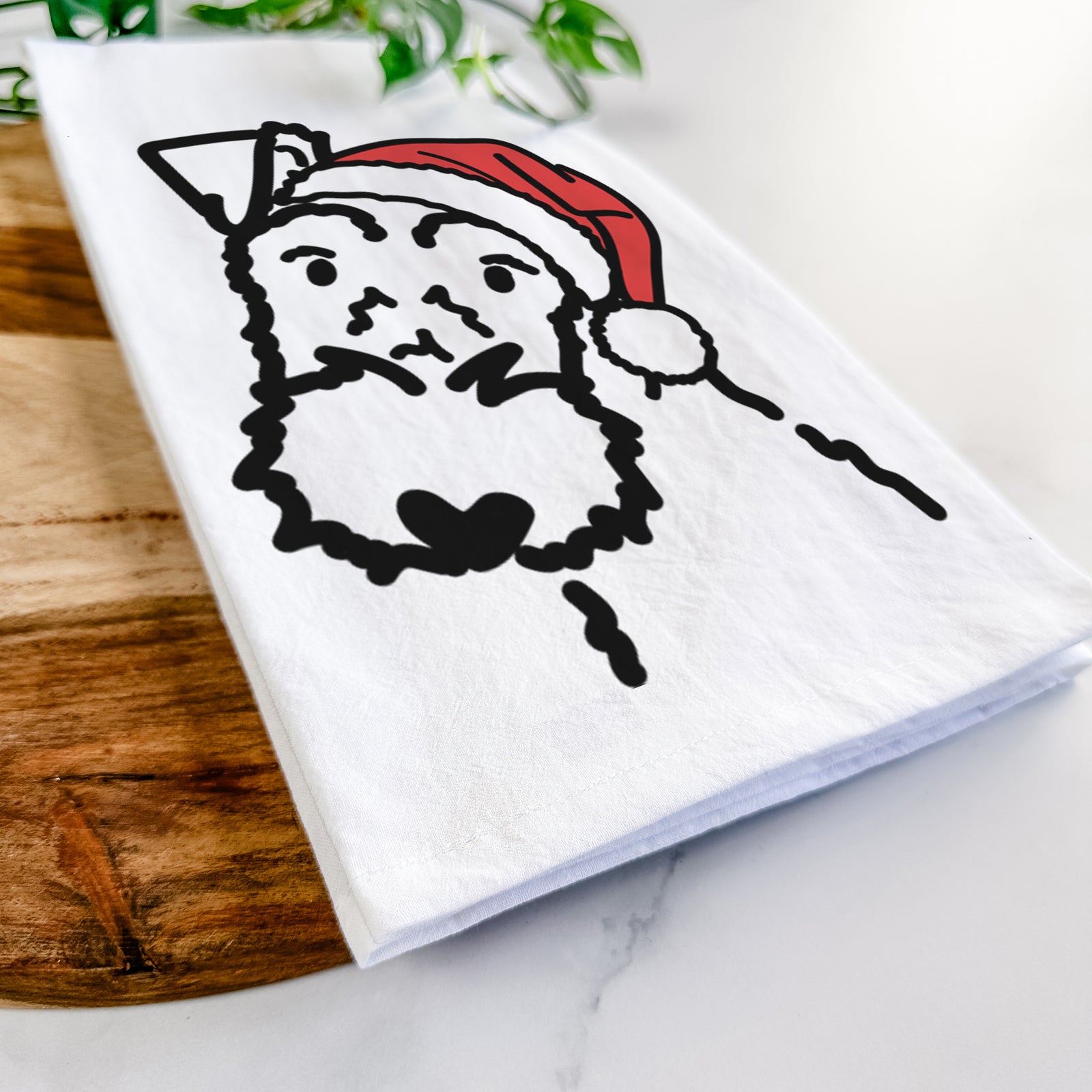 Minimalist line drawing of a Wire Fox Terrier wearing a Santa hat on a tea towel