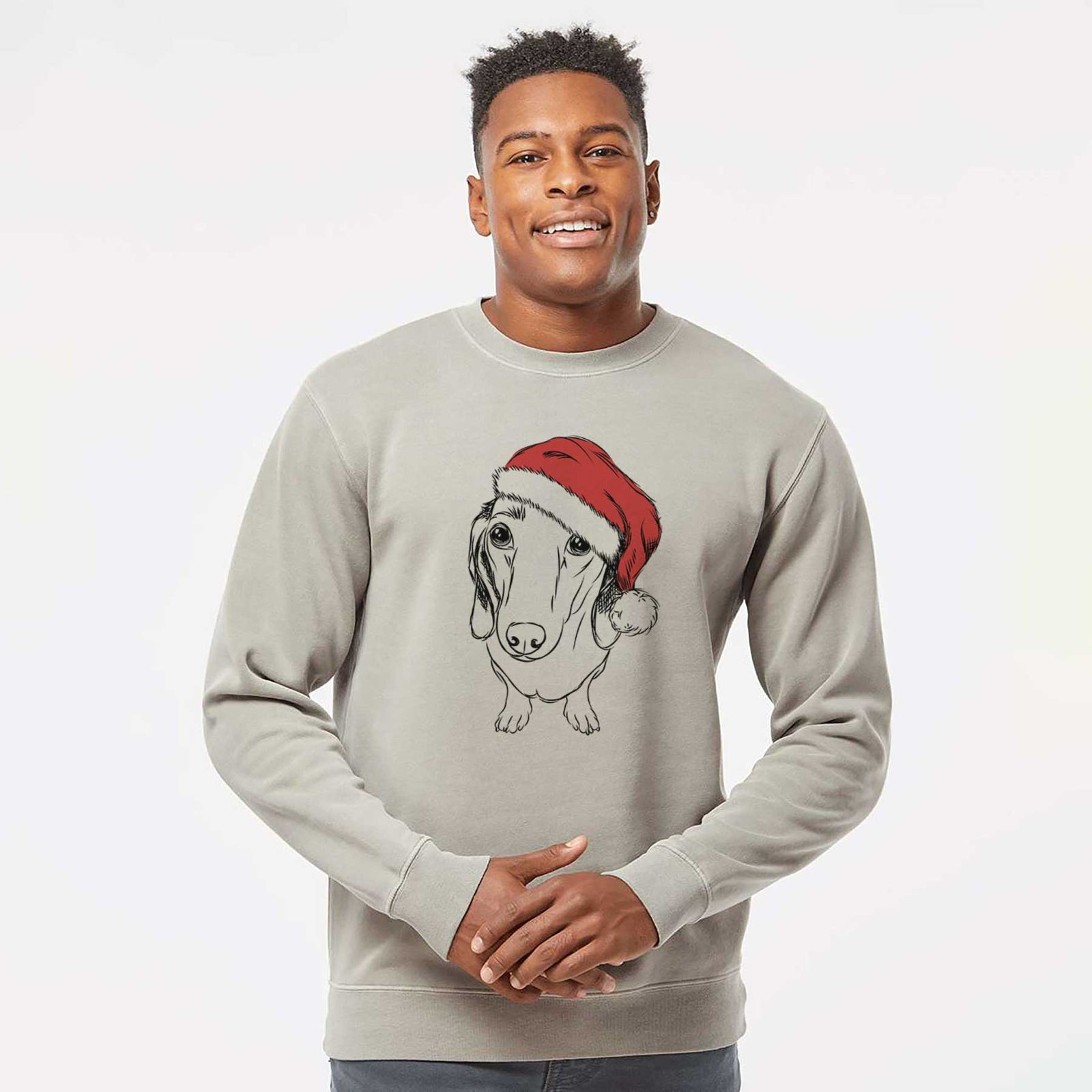 Hand-drawn sketch of Annabelle the Dachshund wearing a Santa hat on a Cement Unisex pigment dyed crew sweatshirt