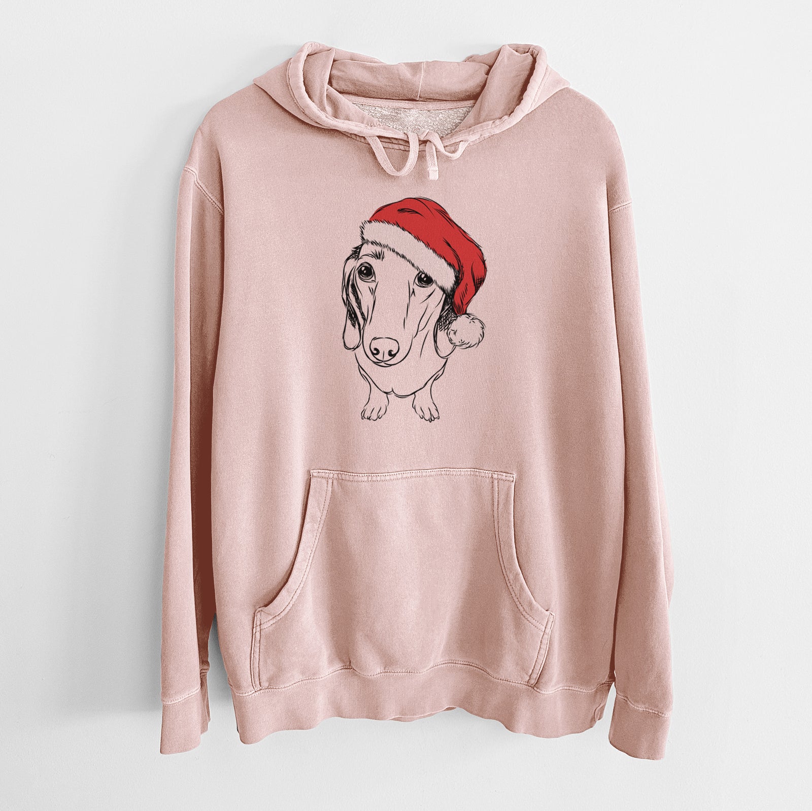 Hand-drawn sketch of Annabelle the Dachshund wearing a Santa hat on a Dusty Pink Unisex pigment dyed hoodie