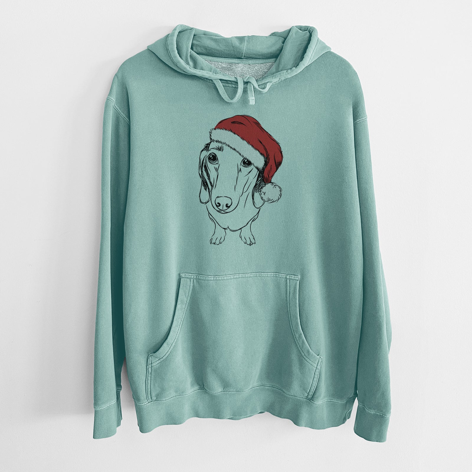 Hand-drawn sketch of Annabelle the Dachshund wearing a Santa hat on a Mint Unisex pigment dyed hoodie