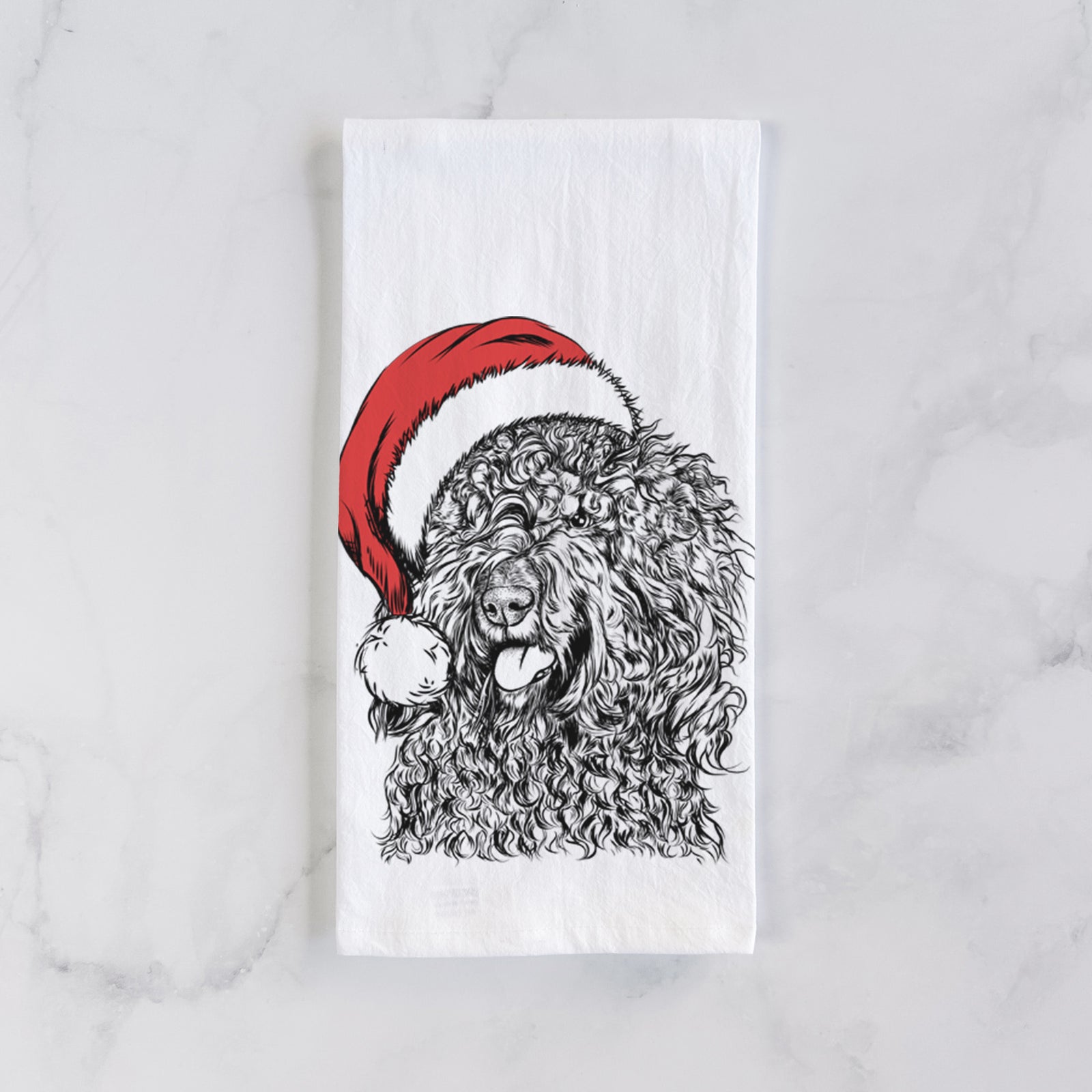 Hand-drawn sketch of Babs the Barbet wearing a Santa hat on a tea towel