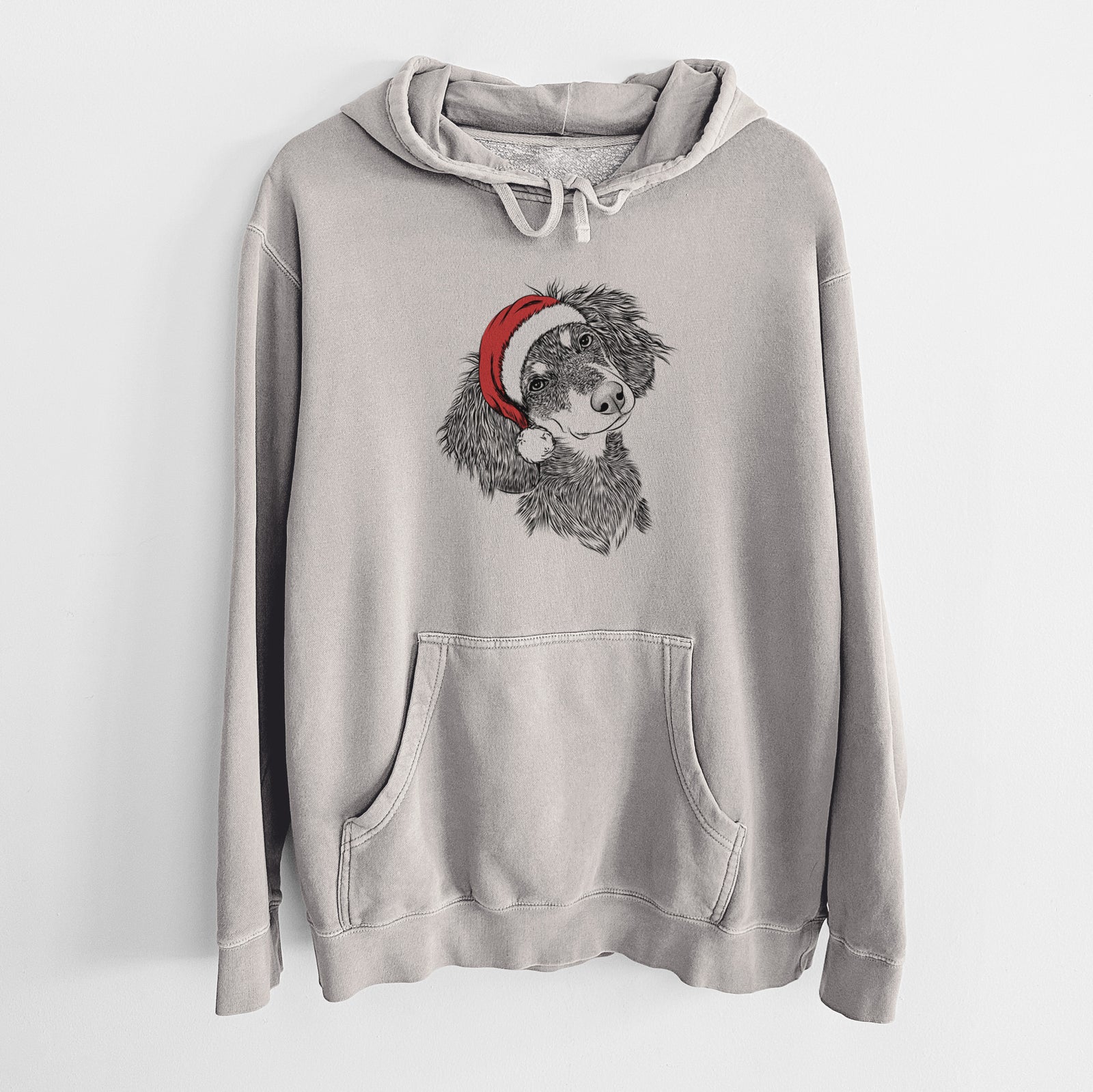 Hand-drawn sketch of Bailey the Long Haired Dachshund wearing a Santa hat on a Cement Unisex pigment dyed hoodie