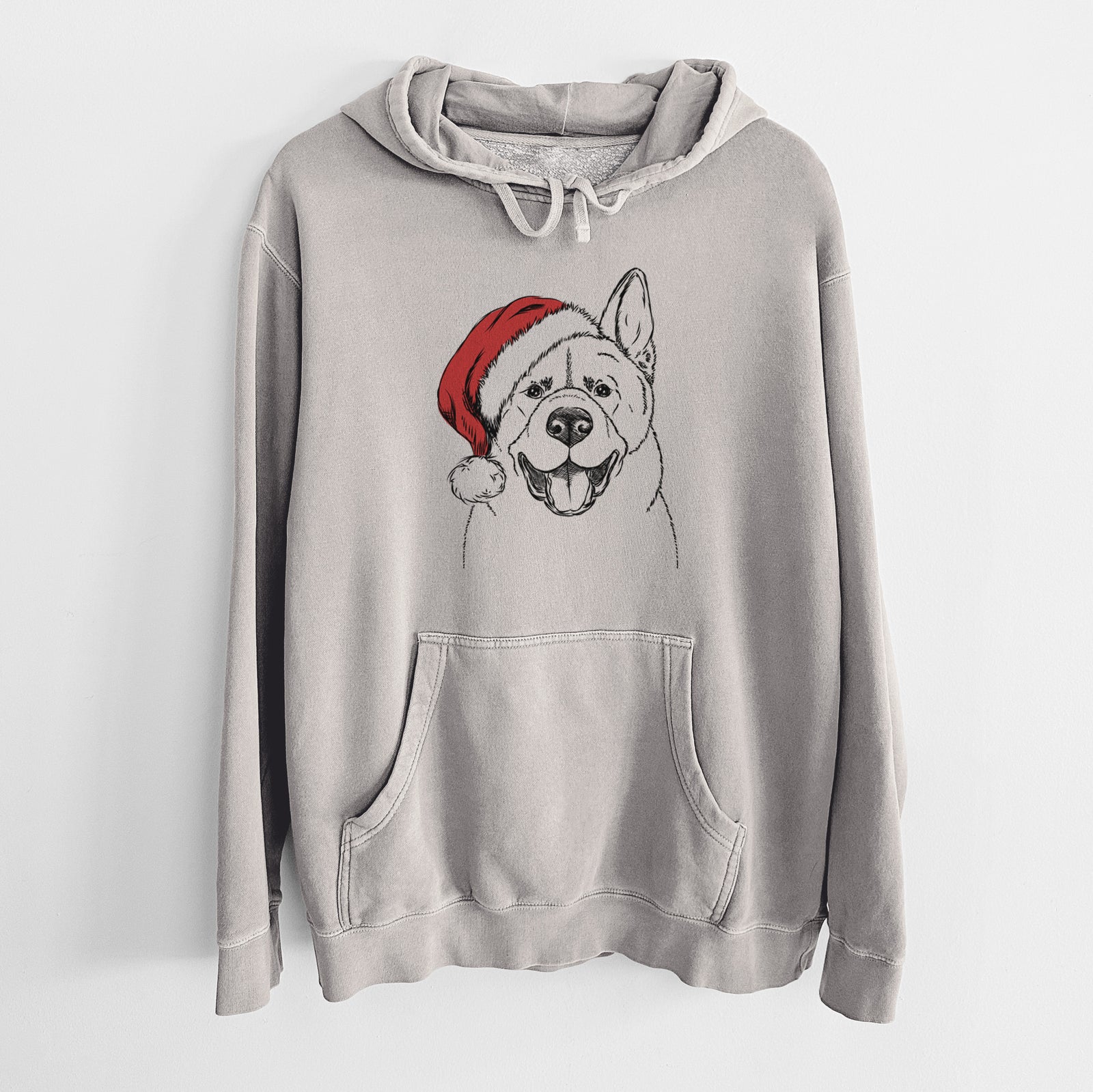 Hand-drawn sketch of Baku the Akita wearing a Santa hat on a Cement Unisex pigment dyed hoodie