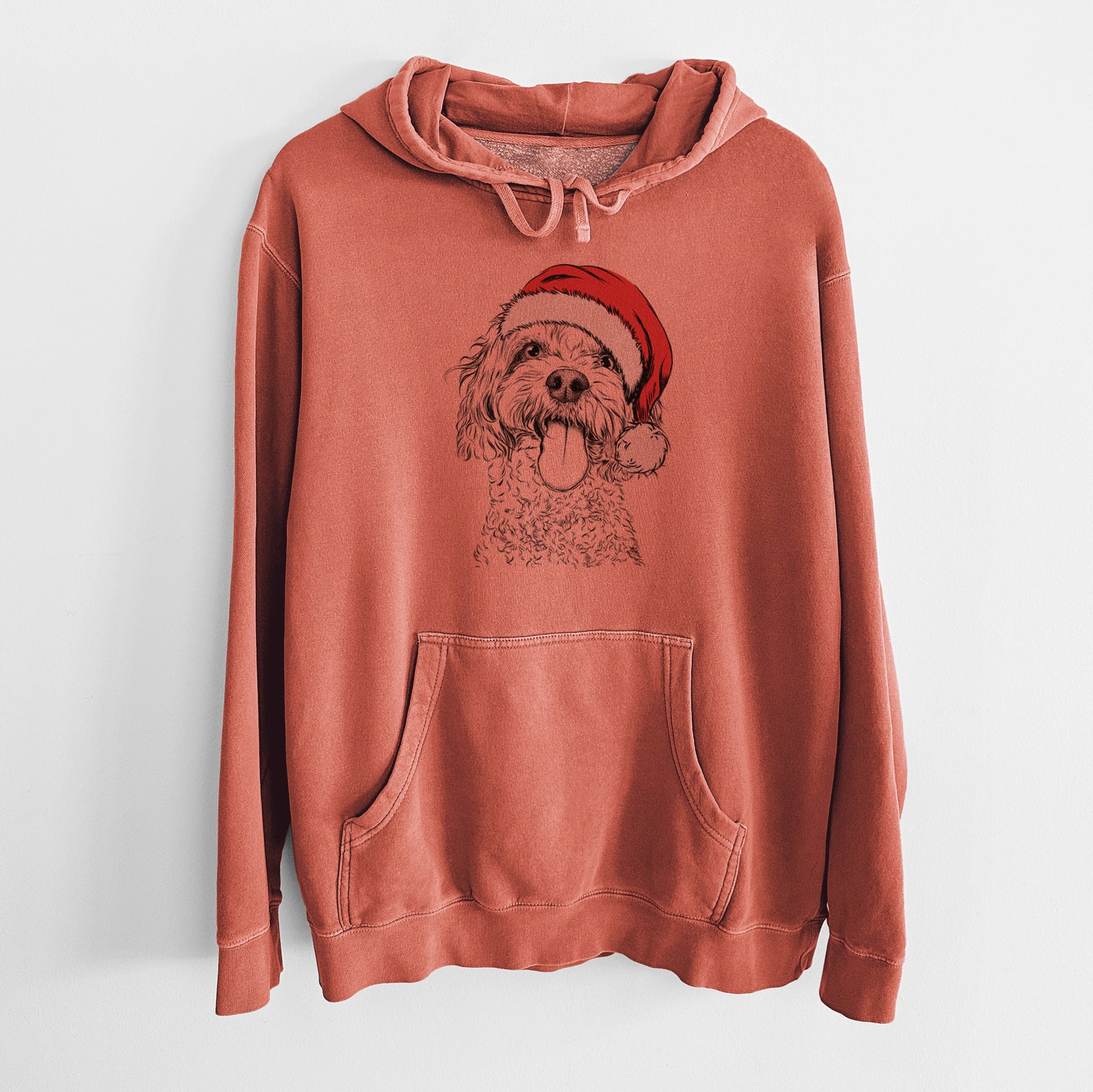 Hand-drawn sketch of Barney the Cavachon wearing a Santa hat on an Amber Unisex pigment dyed hoodie