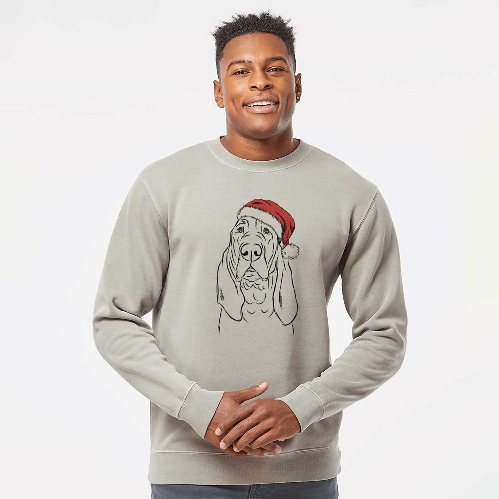 Hand-drawn sketch of Baron the Bloodhound wearing a Santa hat on a Cement Unisex pigment dyed crew sweatshirt