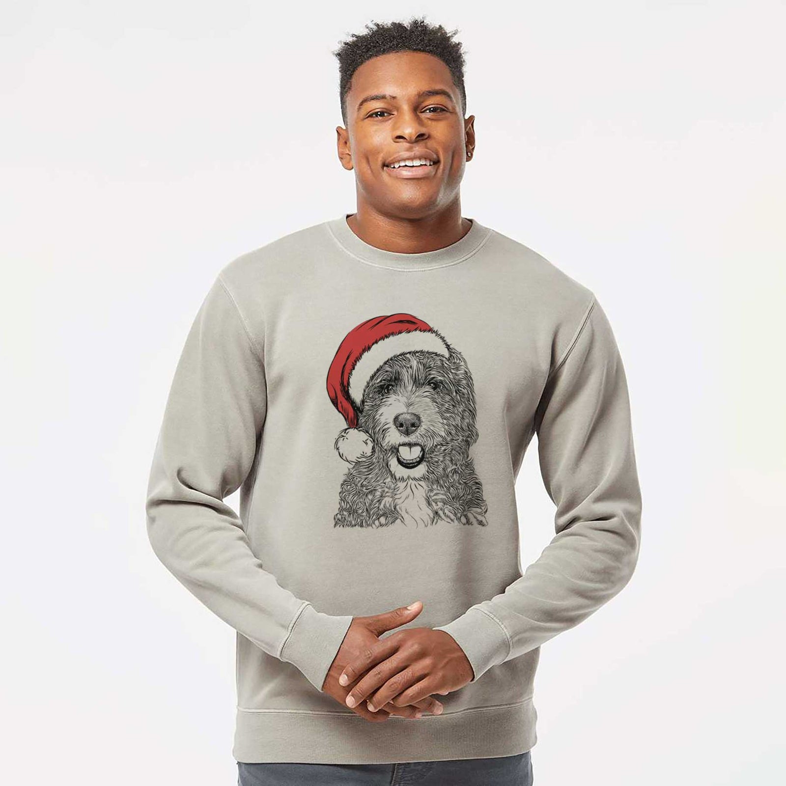 Hand-drawn sketch of Bash the Bernedoodle wearing a Santa hat on a Cement Unisex pigment dyed crew sweatshirt