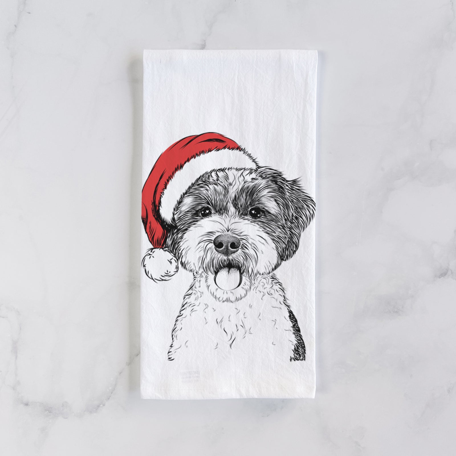 Hand-drawn sketch of Bella the Cockapoo wearing a Santa hat on a tea towel