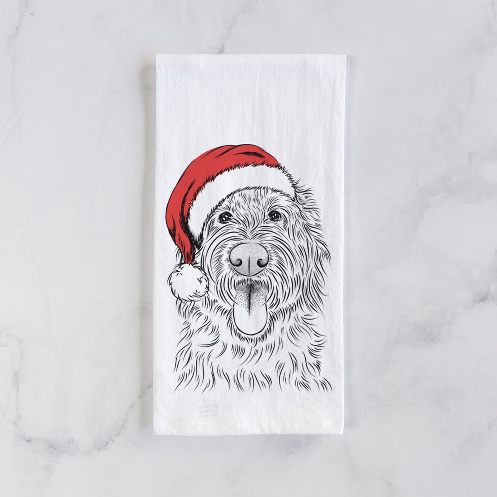 Hand-drawn sketch of Bennett the Doodle wearing a Santa hat on a tea towel