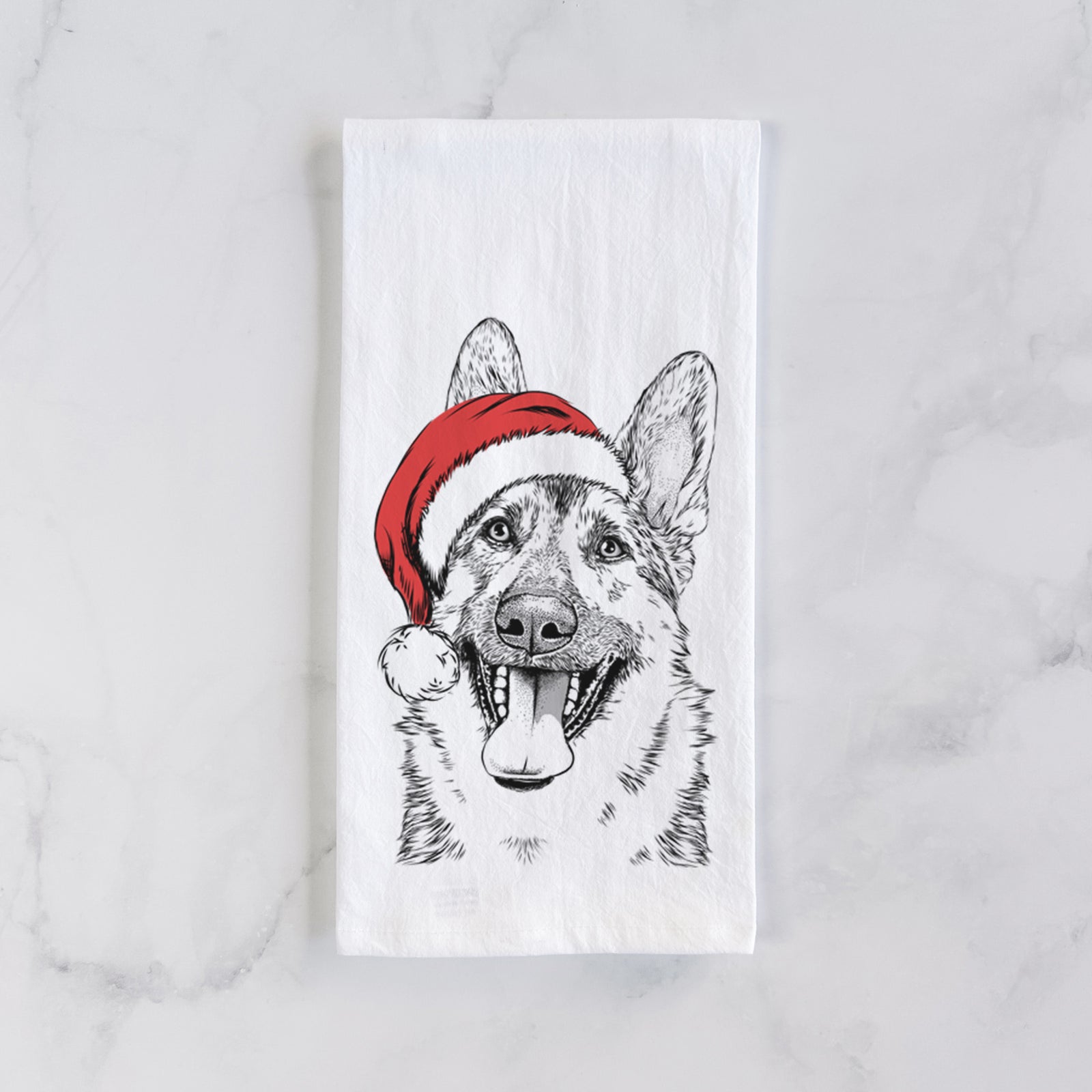 Hand-drawn sketch of Benson the German Shepherd wearing a Santa hat on a tea towel