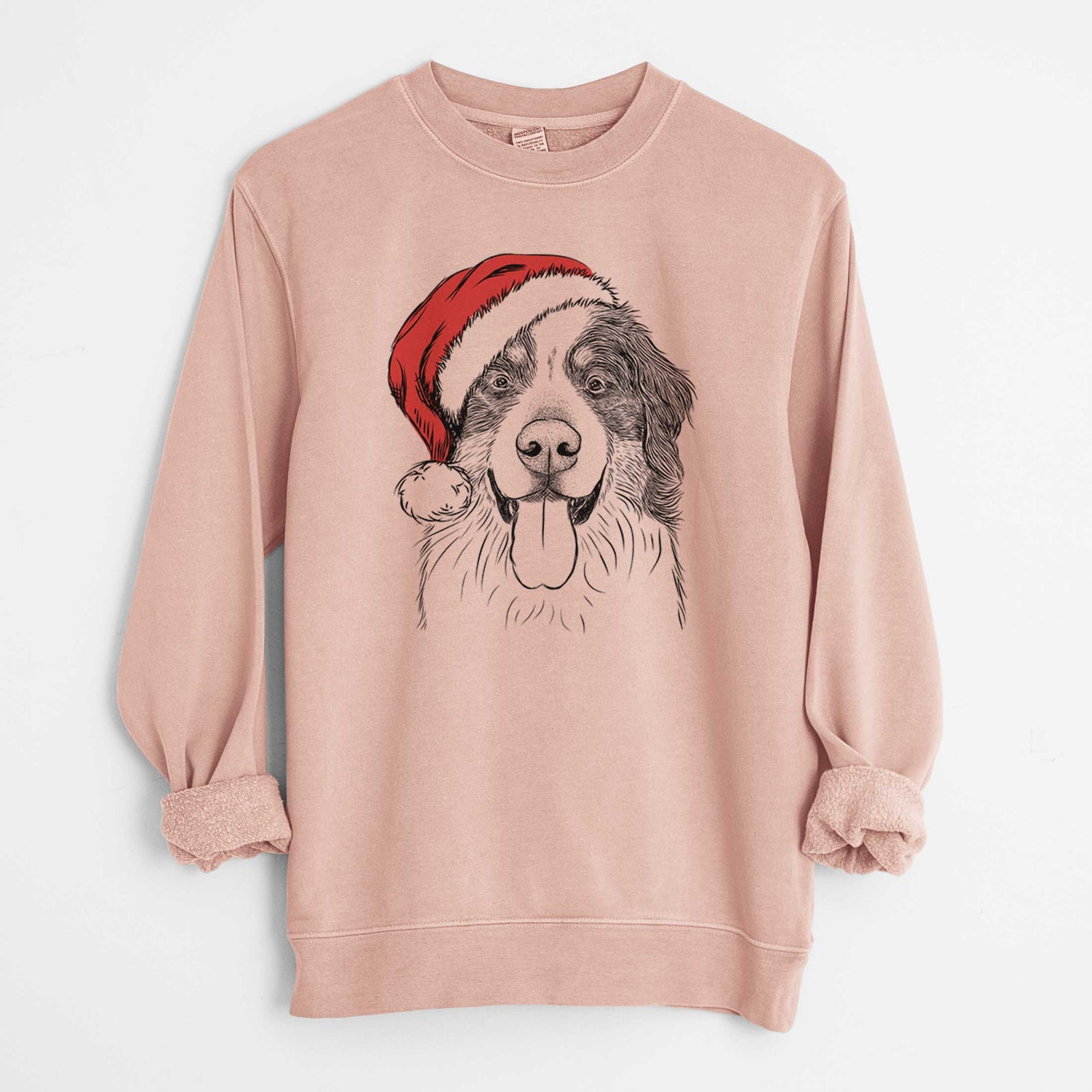 Hand-drawn sketch of Blaze the Bernese Mountain Dog wearing a Santa hat on a Dusty Pink Unisex pigment dyed crew sweatshirt