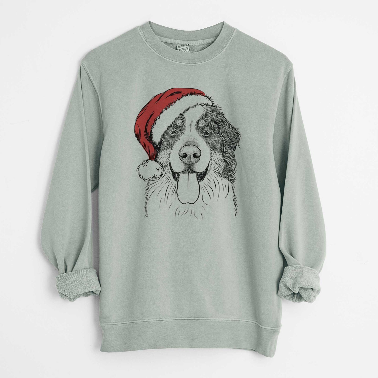 Hand-drawn sketch of Blaze the Bernese Mountain Dog wearing a Santa hat on a Sage Unisex pigment dyed crew sweatshirt