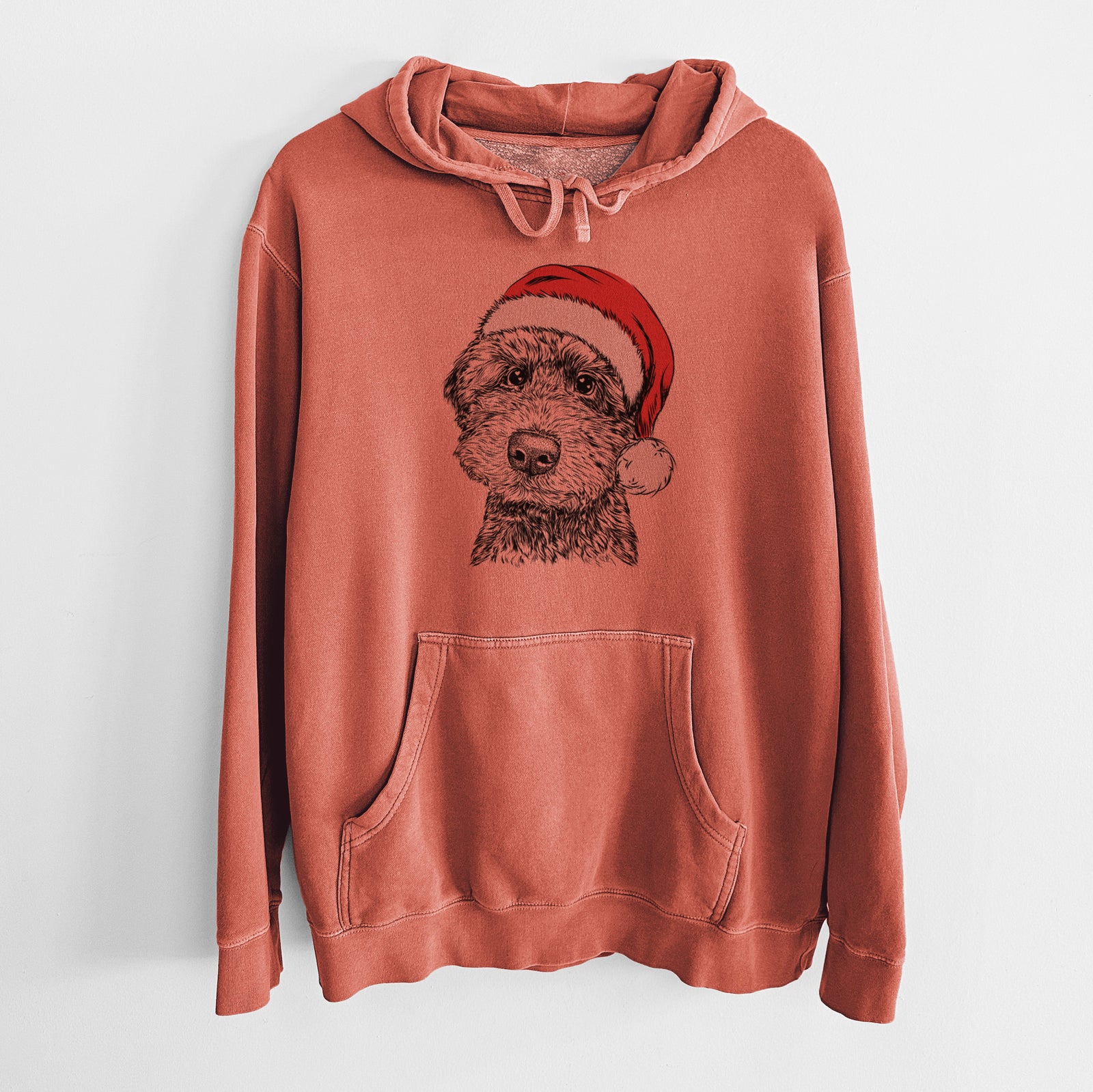 Hand-drawn sketch of Bowser the Whoodle wearing a Santa hat on an Amber Unisex pigment dyed hoodie