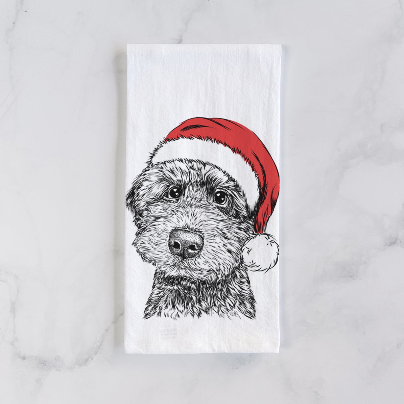Hand-drawn sketch of Bowser the Whoodle wearing a Santa hat on a tea towel