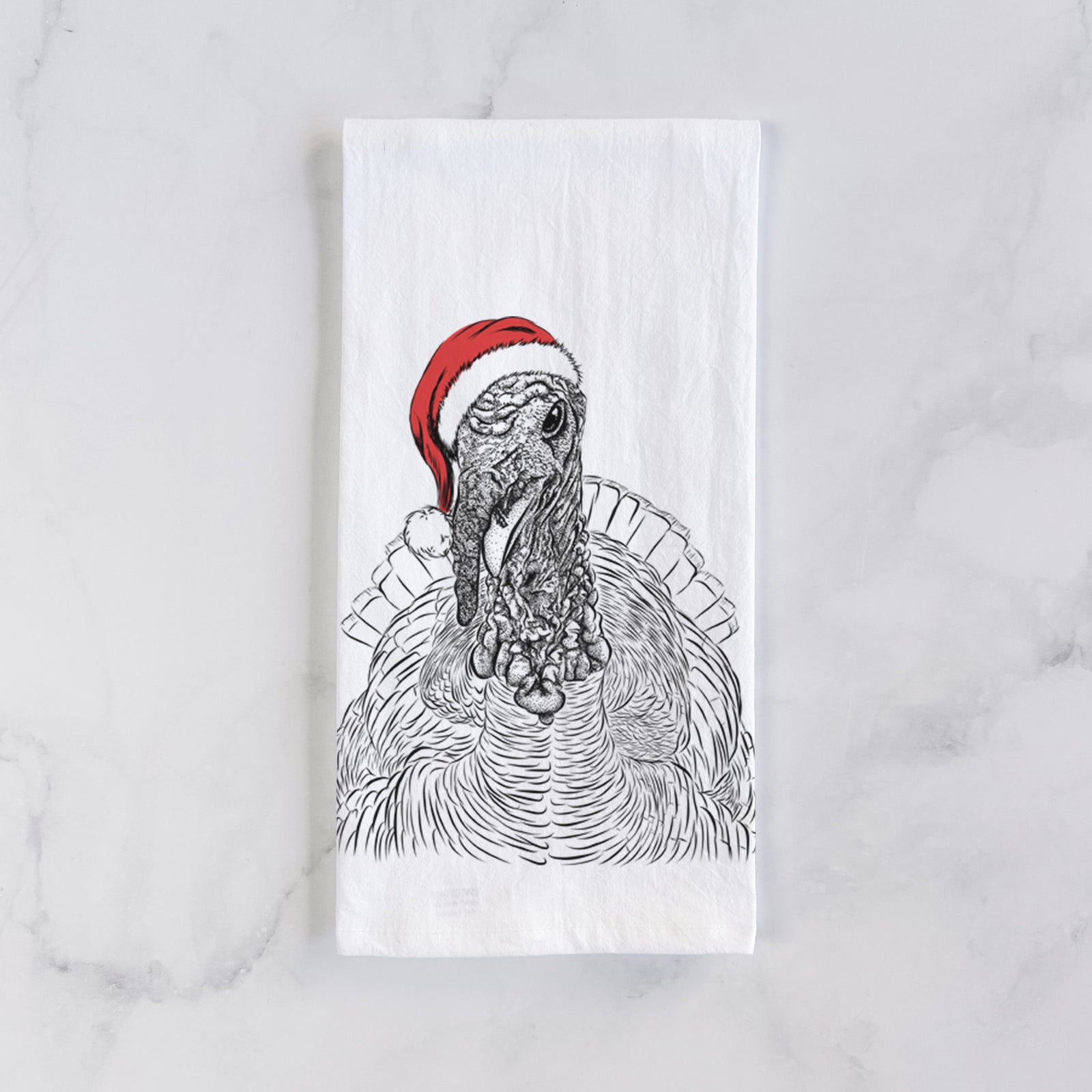Hand-drawn sketch of Brady the Turkey wearing a Santa hat on a tea towel