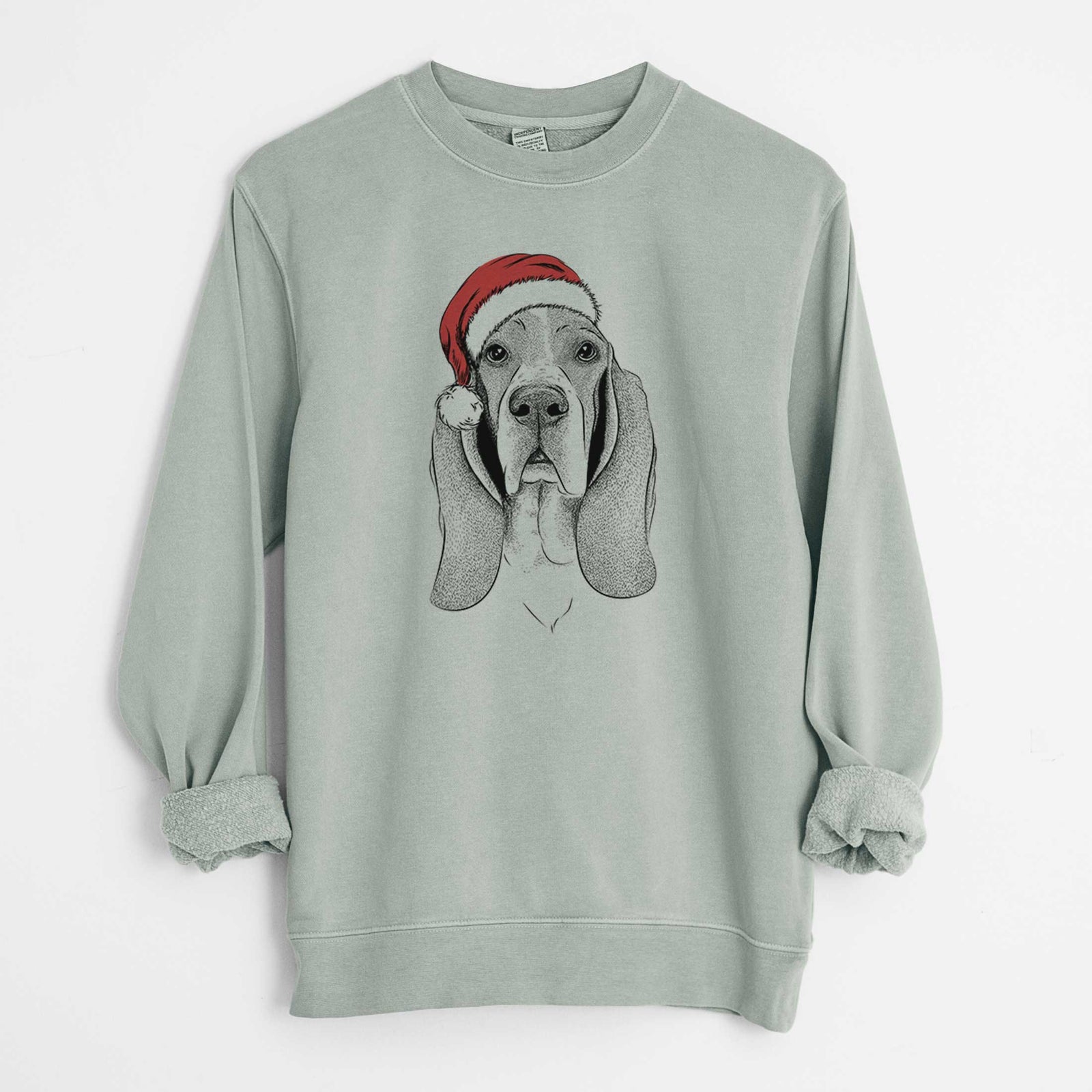 Hand-drawn sketch of Buckley the Basset Hound wearing a Santa hat on a Sage Unisex pigment dyed crew sweatshirt