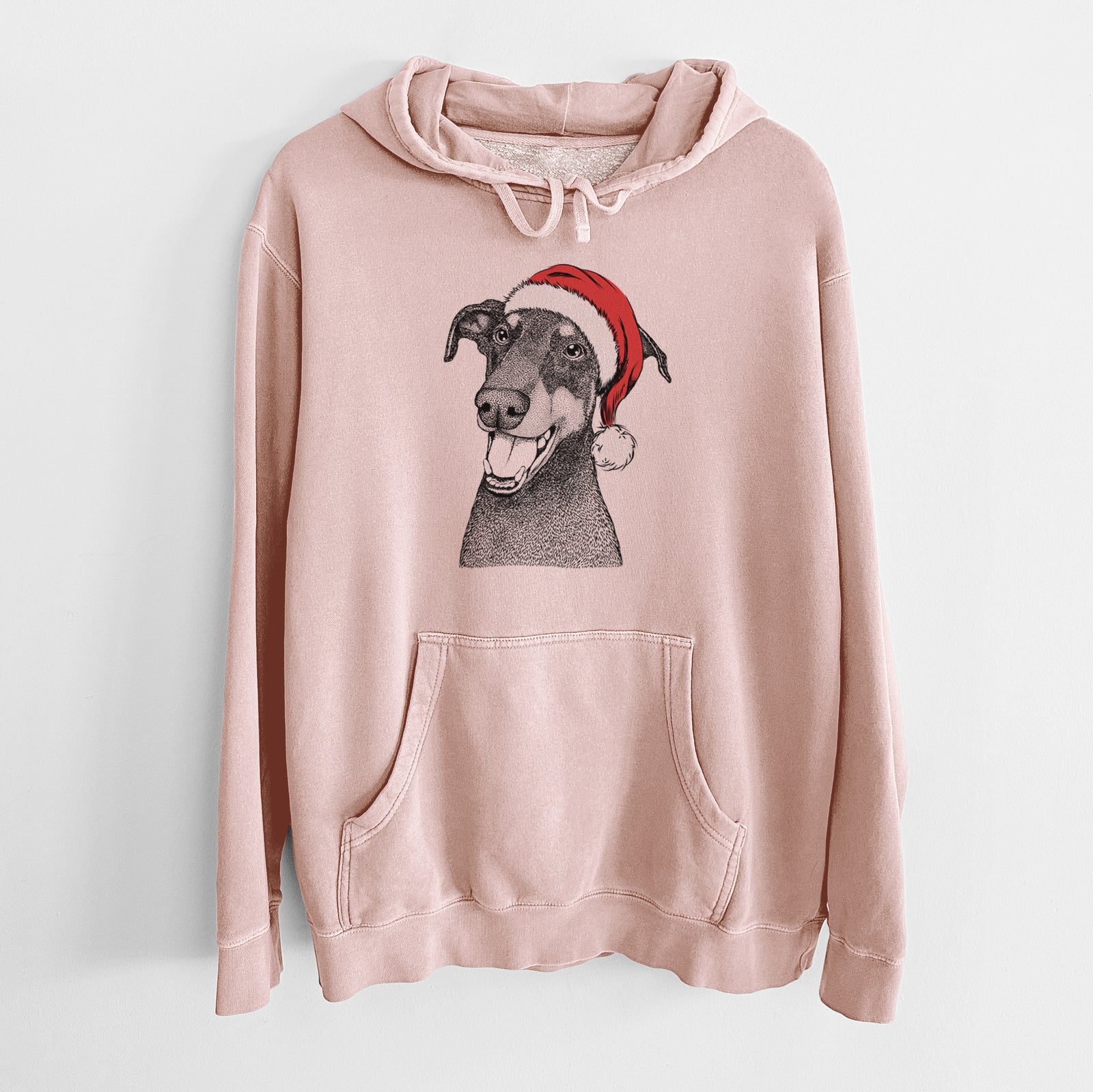 Hand-drawn sketch of Bunnie the Doberman Pinscher wearing a Santa hat on a Dusty Pink Unisex pigment dyed hoodie