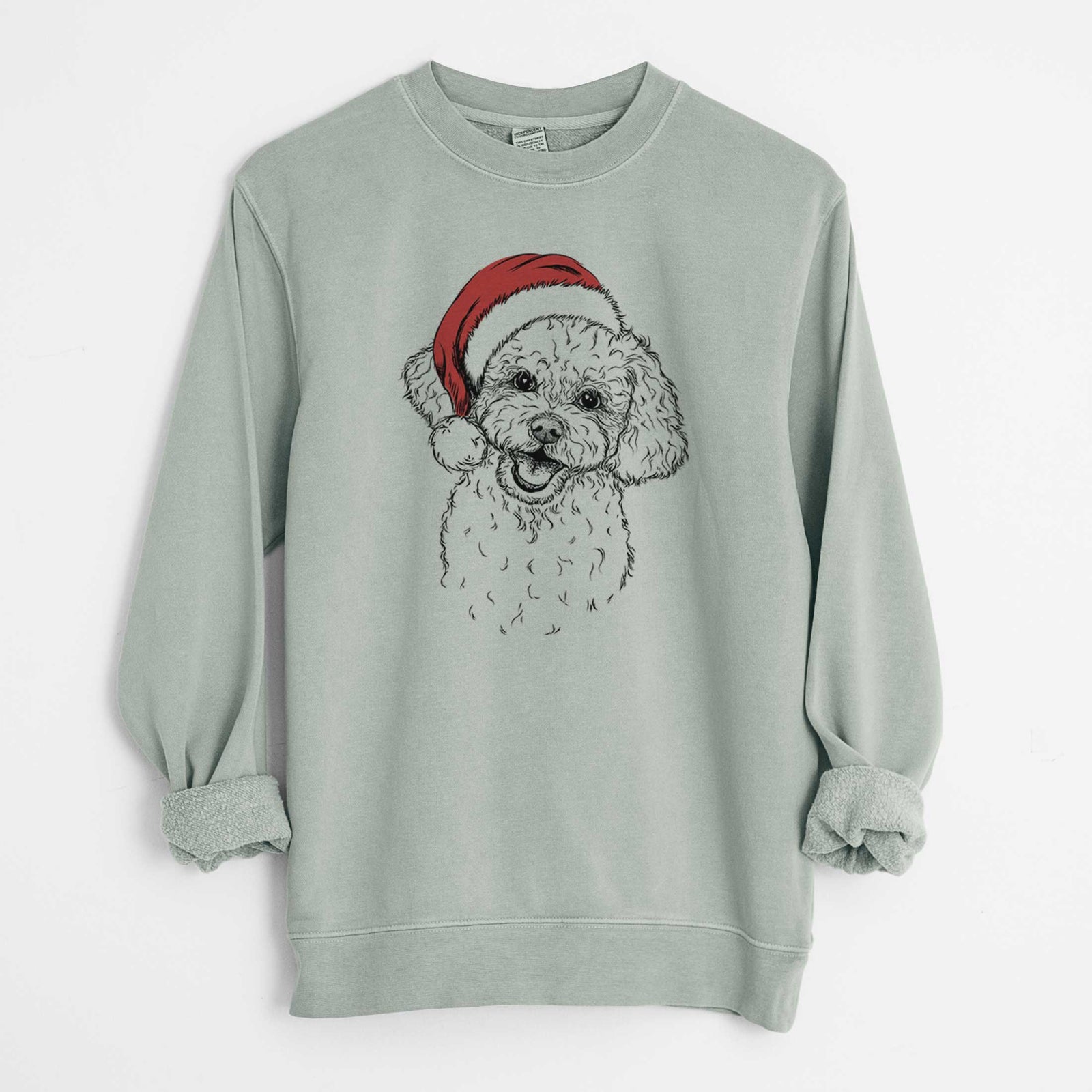 Hand-drawn sketch of Caesar the Bichon Frise wearing a Santa hat on a Sage Unisex pigment dyed crew sweatshirt