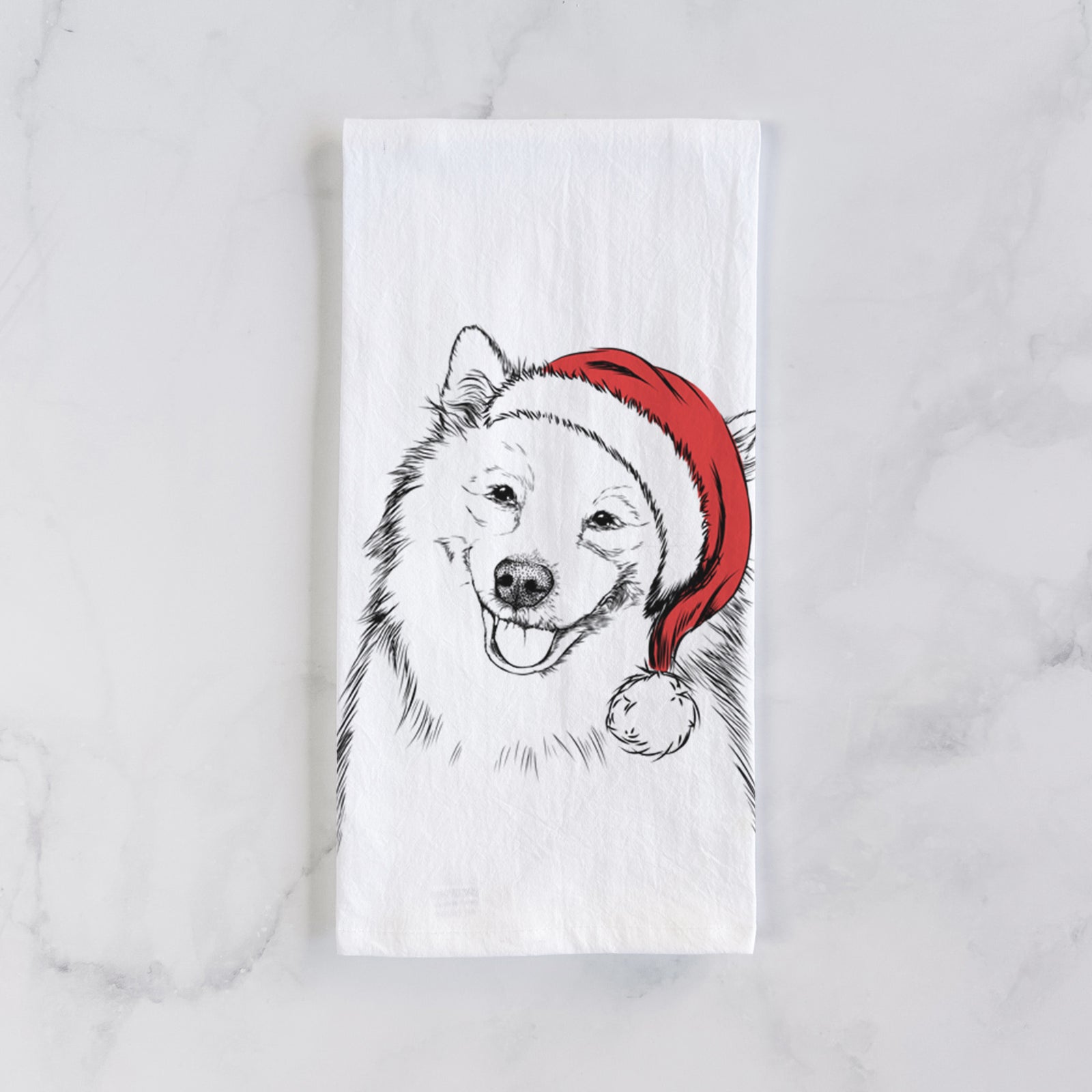Hand-drawn sketch of Caico the Samoyed wearing a Santa hat on a tea towel