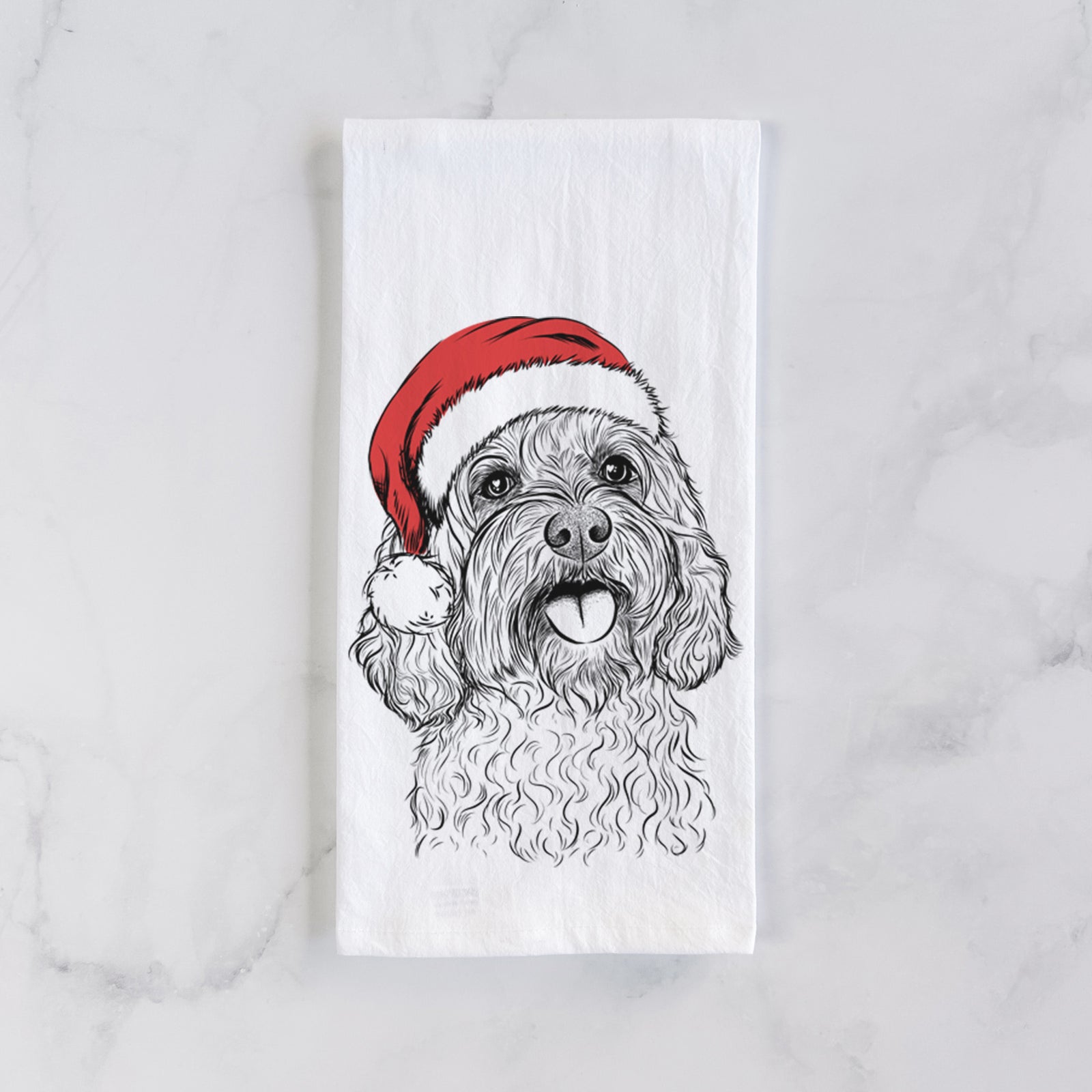 Hand-drawn sketch of Cali the Cavapoo wearing a Santa hat on a tea towel