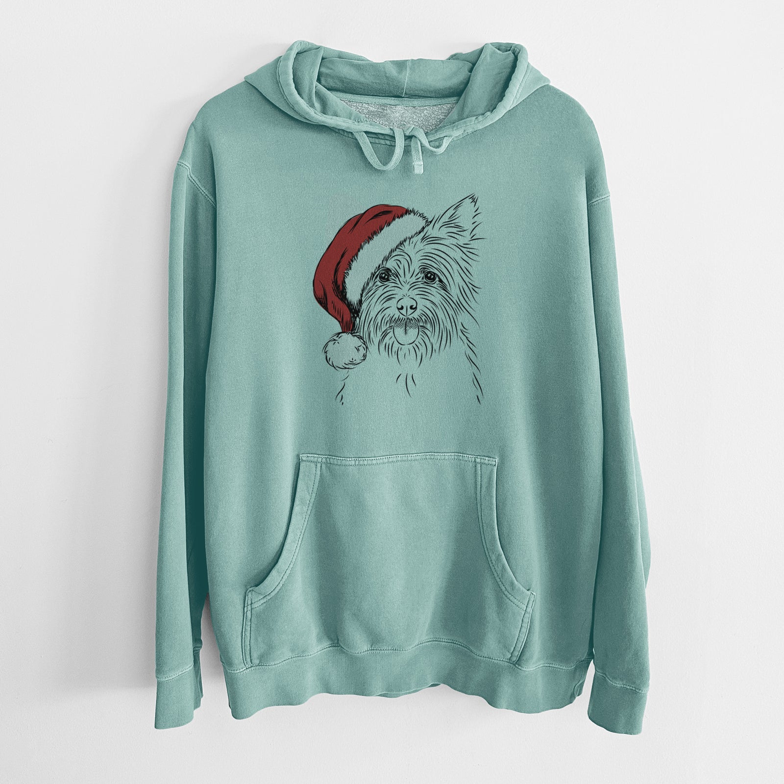 Hand-drawn sketch of Calum the Cairn Terrier wearing a Santa hat on a Mint Unisex pigment dyed hoodie