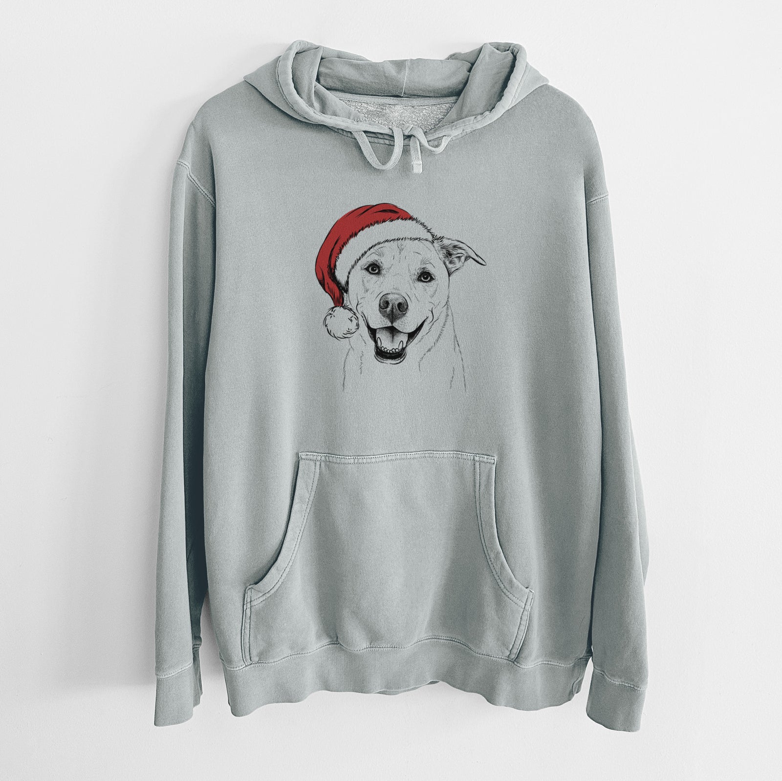 Hand-drawn sketch of Carl the Mixed Breed wearing a Santa hat on a Sage Unisex pigment dyed hoodie