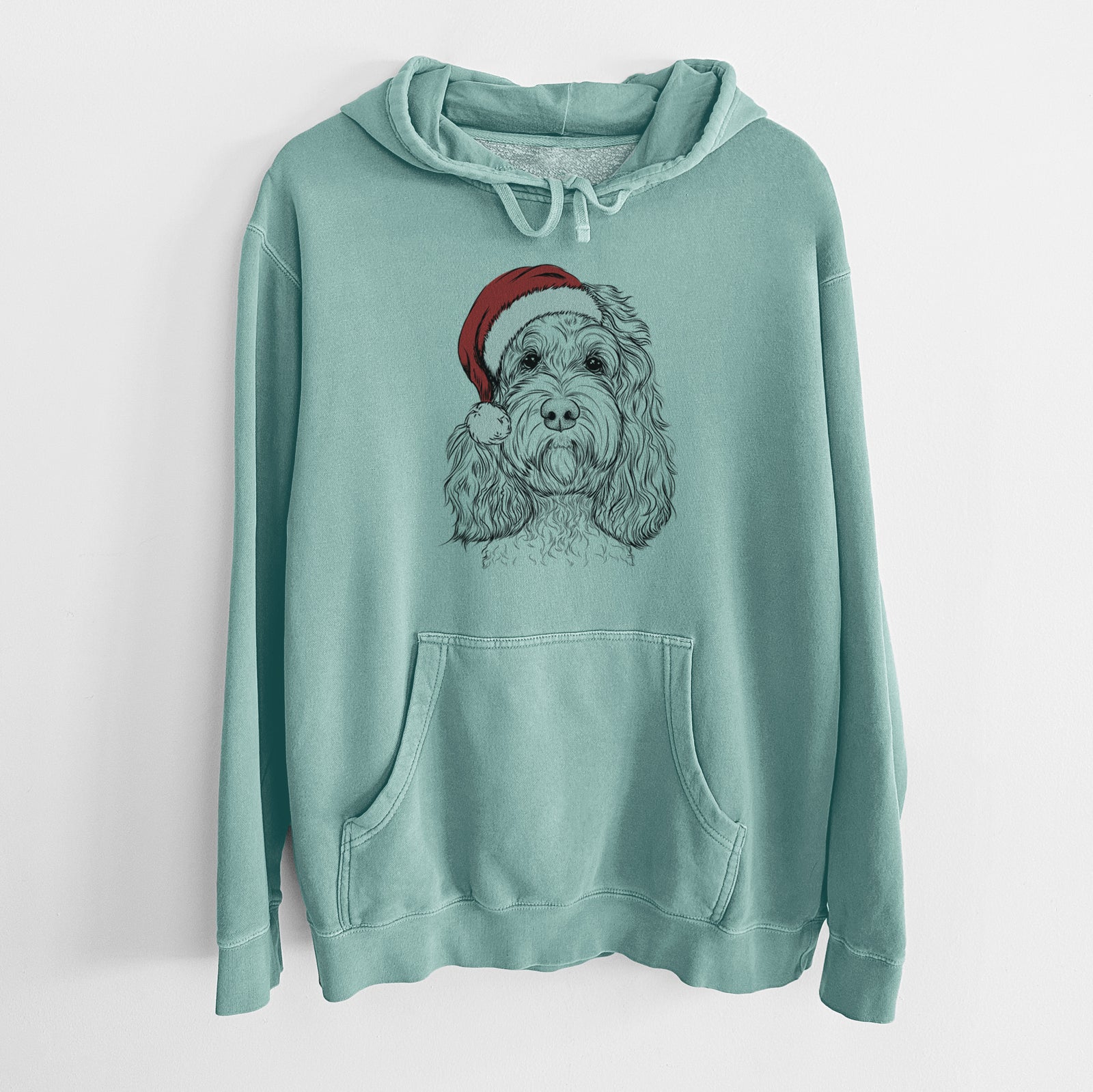 Hand-drawn sketch of Chloe the Cockapoo wearing a Santa hat on a Mint Unisex pigment dyed hoodie