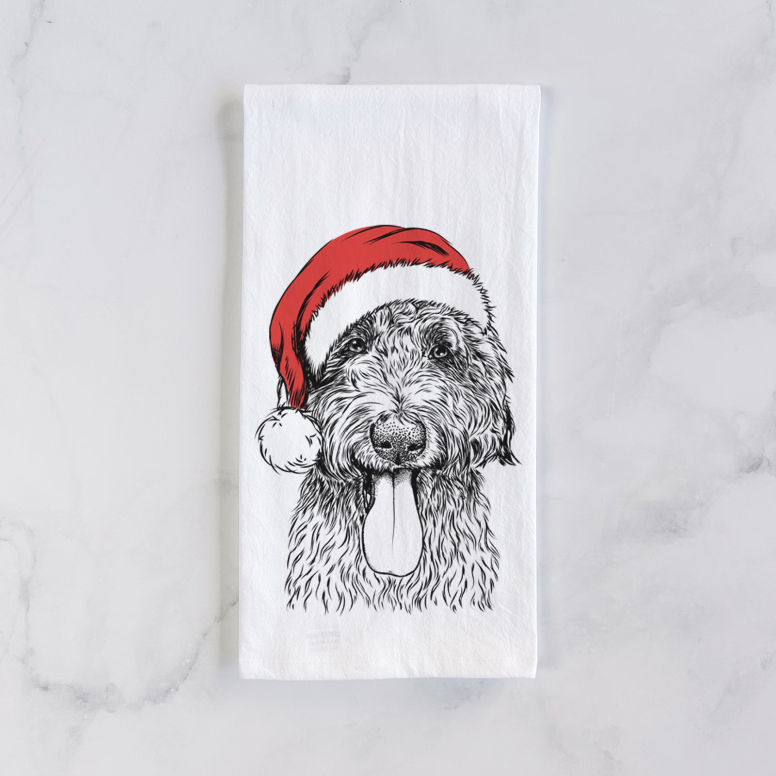 Hand-drawn sketch of CiCi Paulk the Aussiedoodle wearing a Santa hat on a tea towel