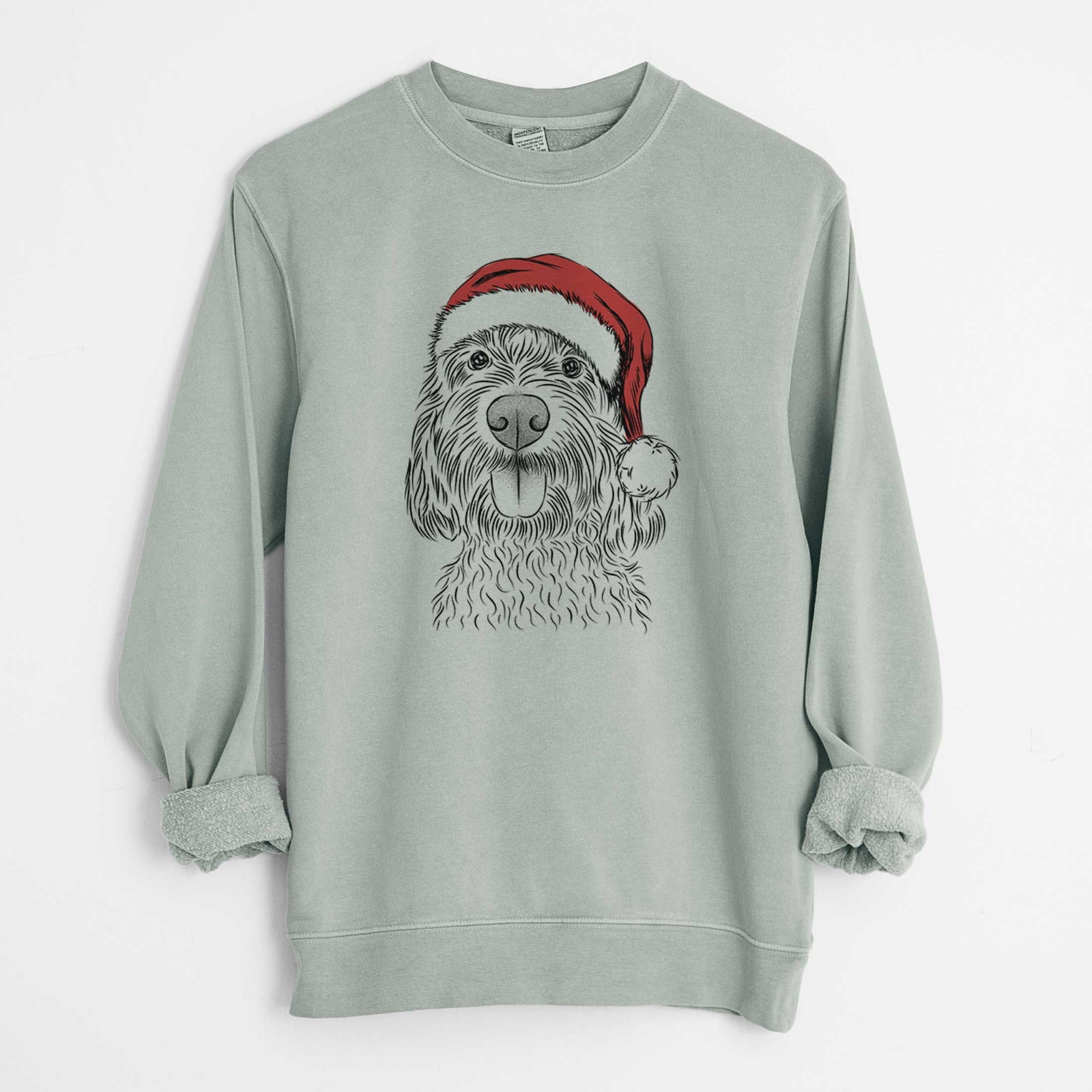 Hand-drawn sketch of Clover the Cockapoo wearing a Santa hat on a Sage Unisex pigment dyed crew sweatshirt