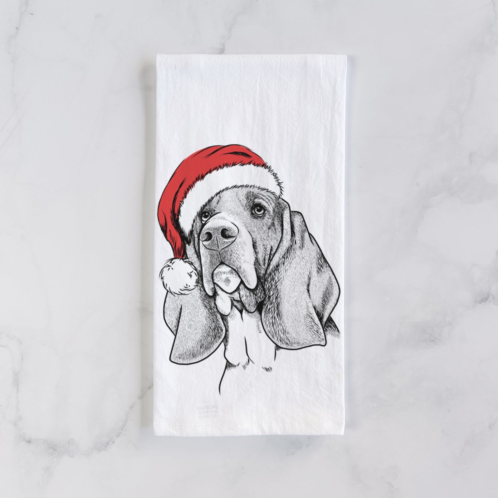 Hand-drawn sketch of Cooper the Basset Hound wearing a Santa hat on a tea towel