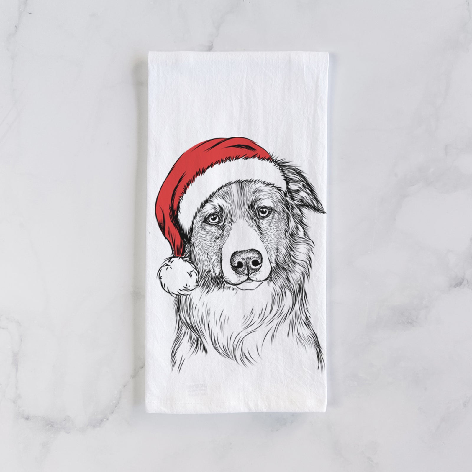 Hand-drawn sketch of Cynder the English Shepherd wearing a Santa hat on a tea towel