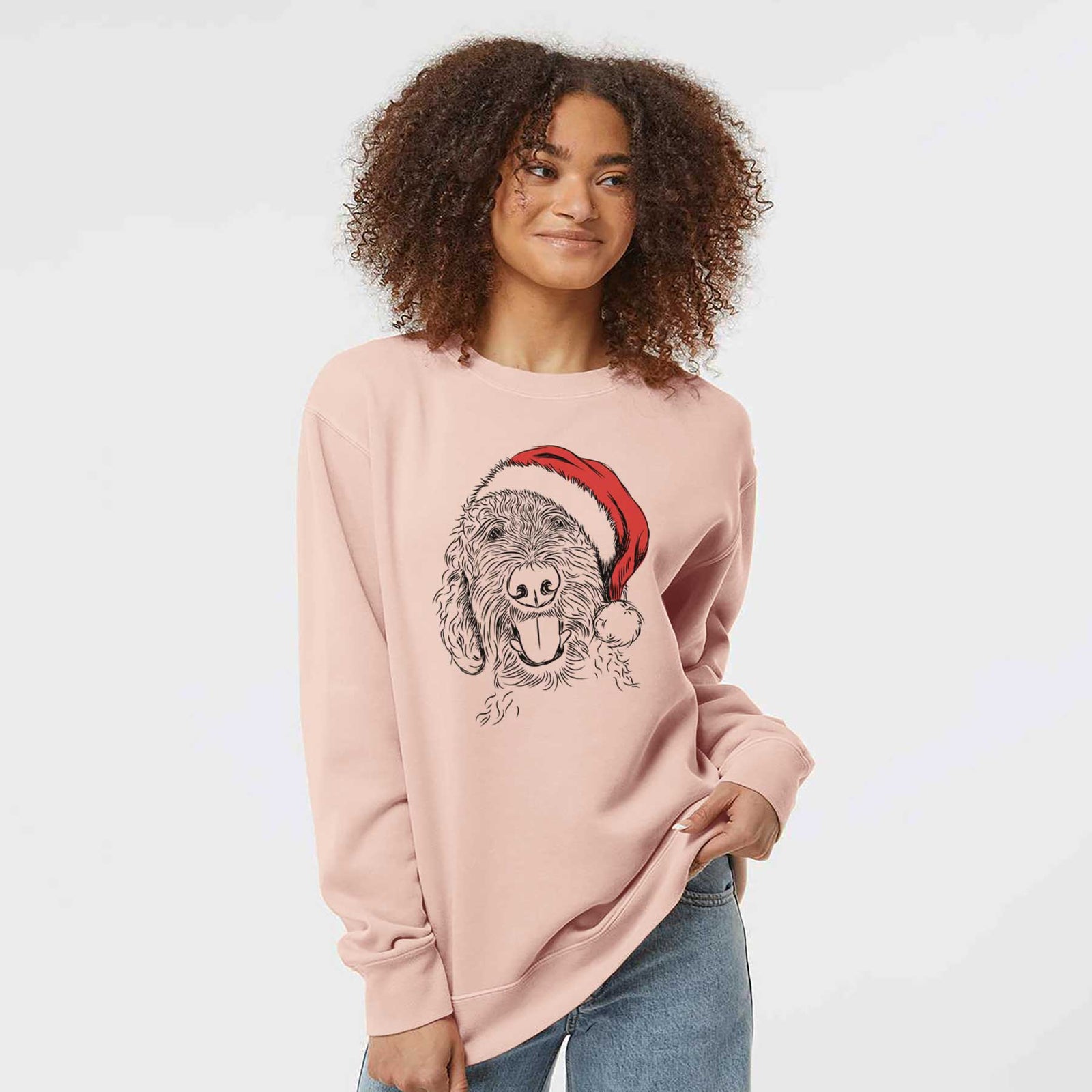Hand-drawn sketch of Dixie the Doodle wearing a Santa hat on a Dusty Pink Unisex pigment dyed crew sweatshirt