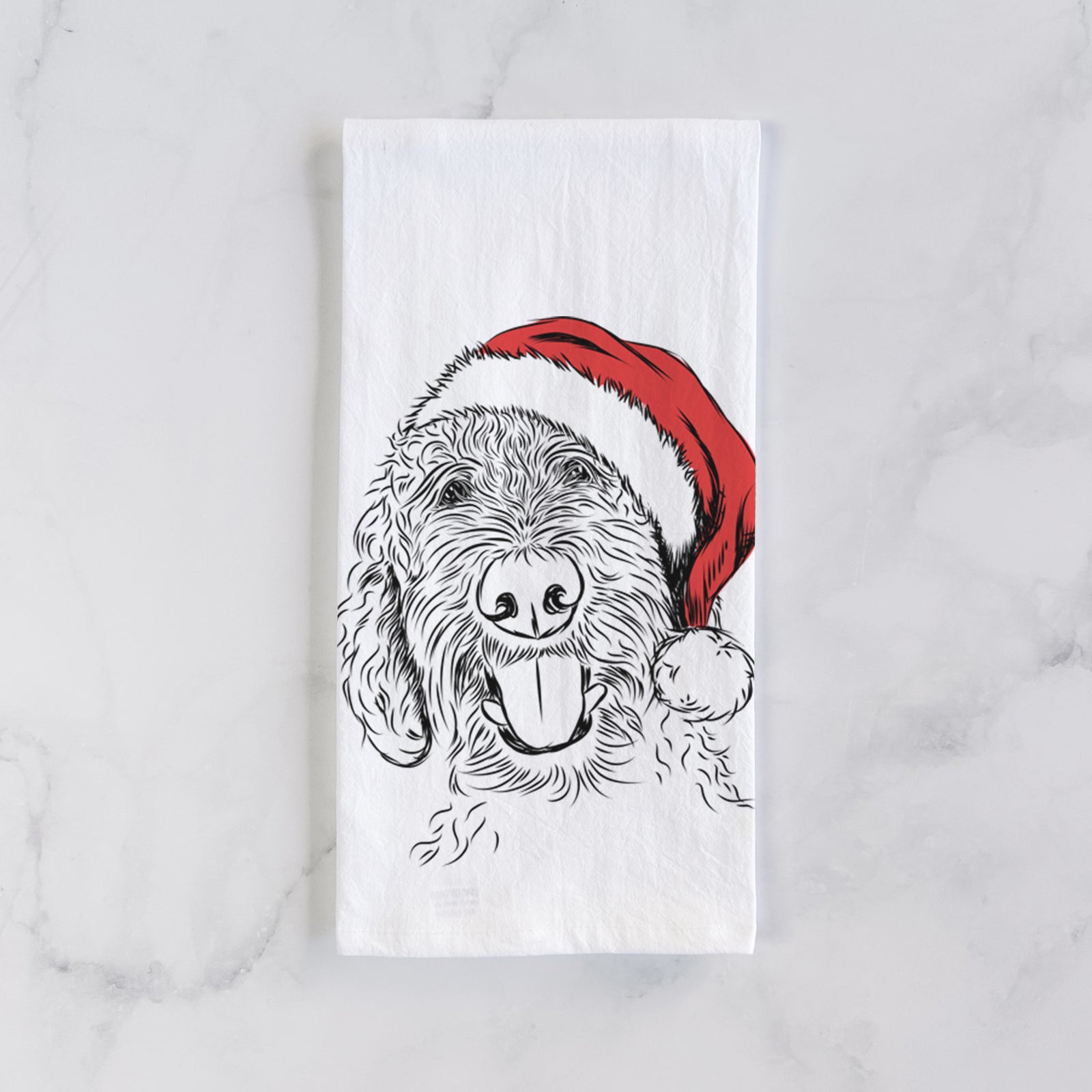 Hand-drawn sketch of Dixie the Doodle wearing a Santa hat on a tea towel