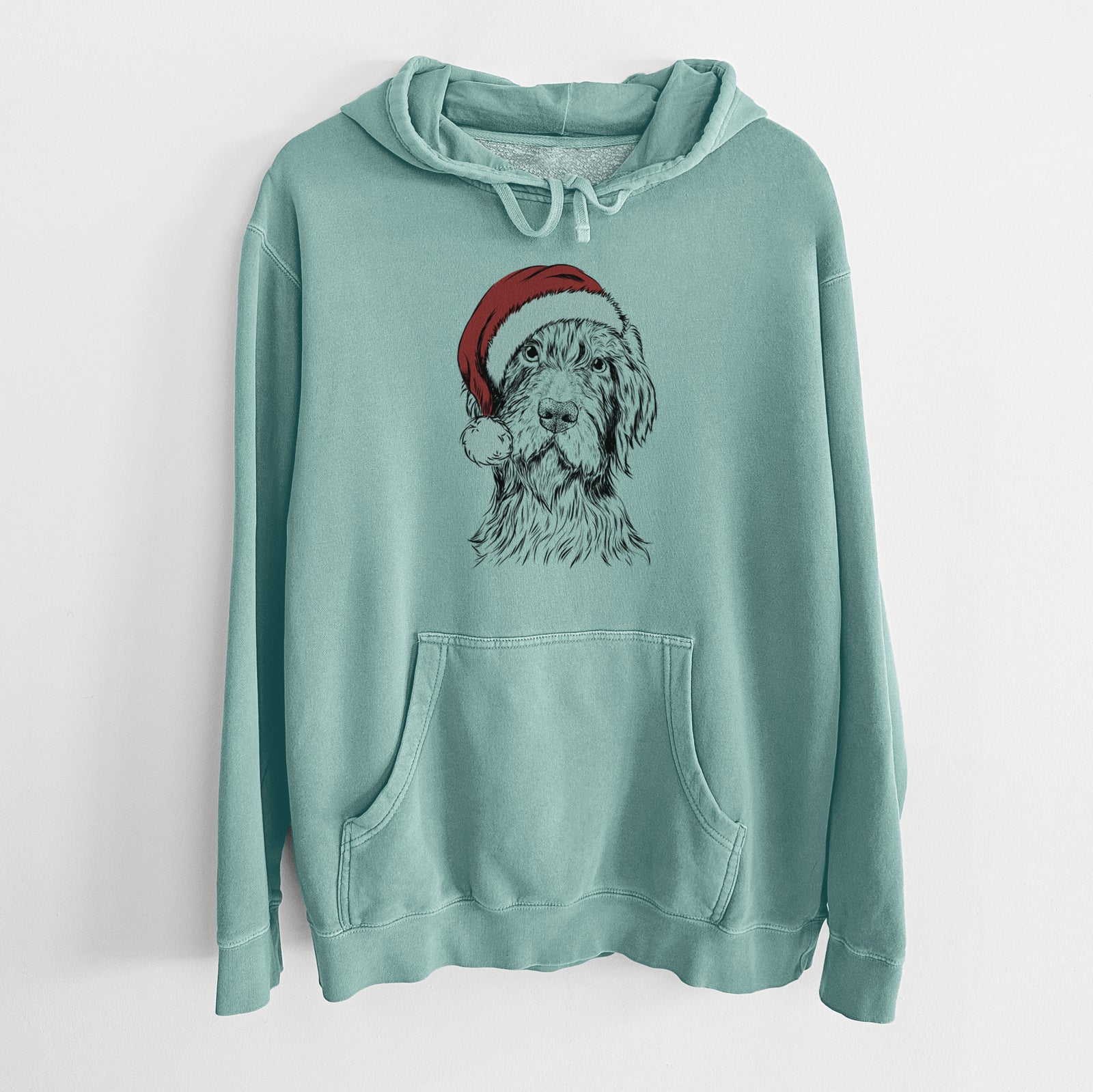 Hand-drawn sketch of Doc Holliday the Pudelpointer wearing a Santa hat on a Mint Unisex pigment dyed hoodie