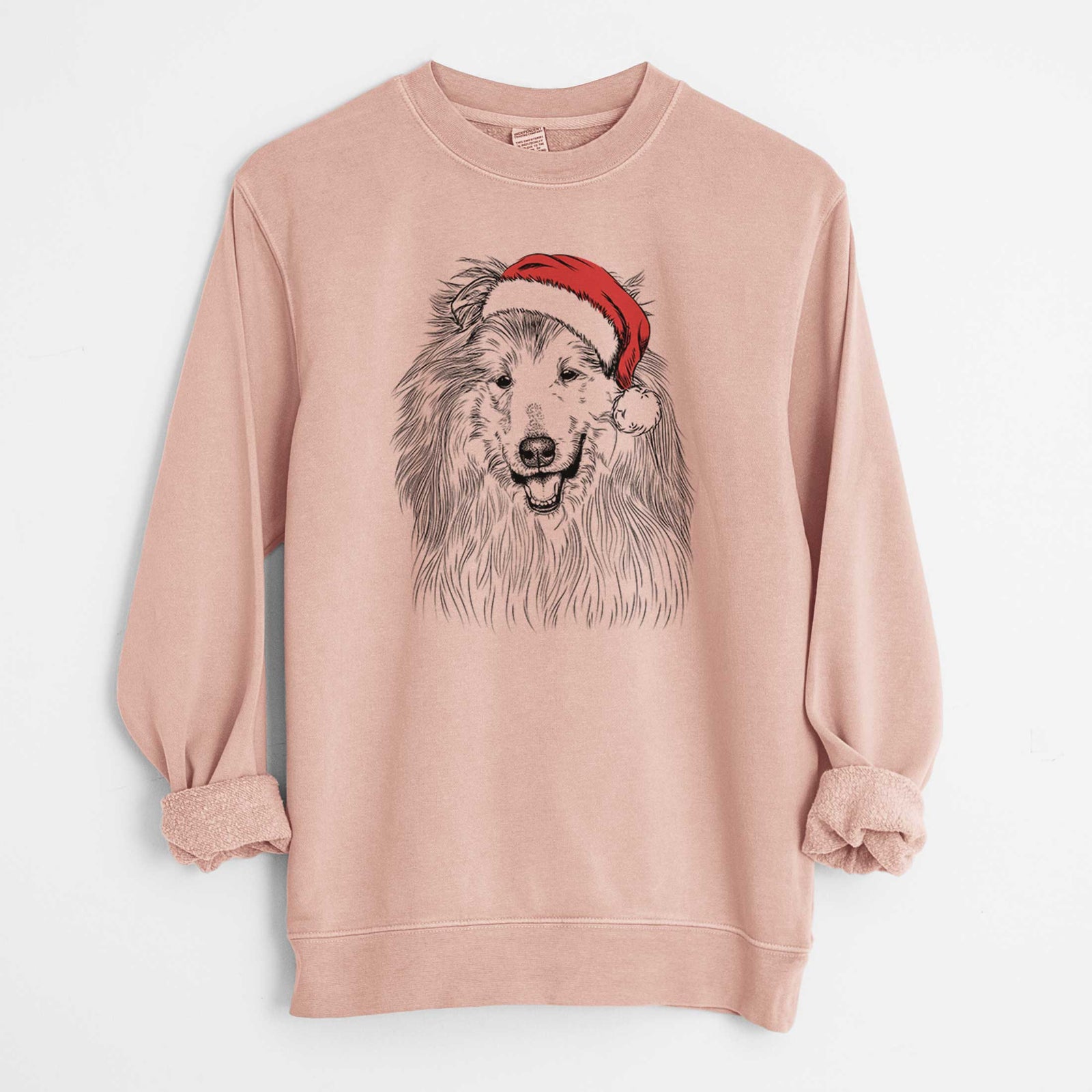 Hand-drawn sketch of Donnan the Rough Collie wearing a Santa hat on a Dusty Pink Unisex pigment dyed crew sweatshirt