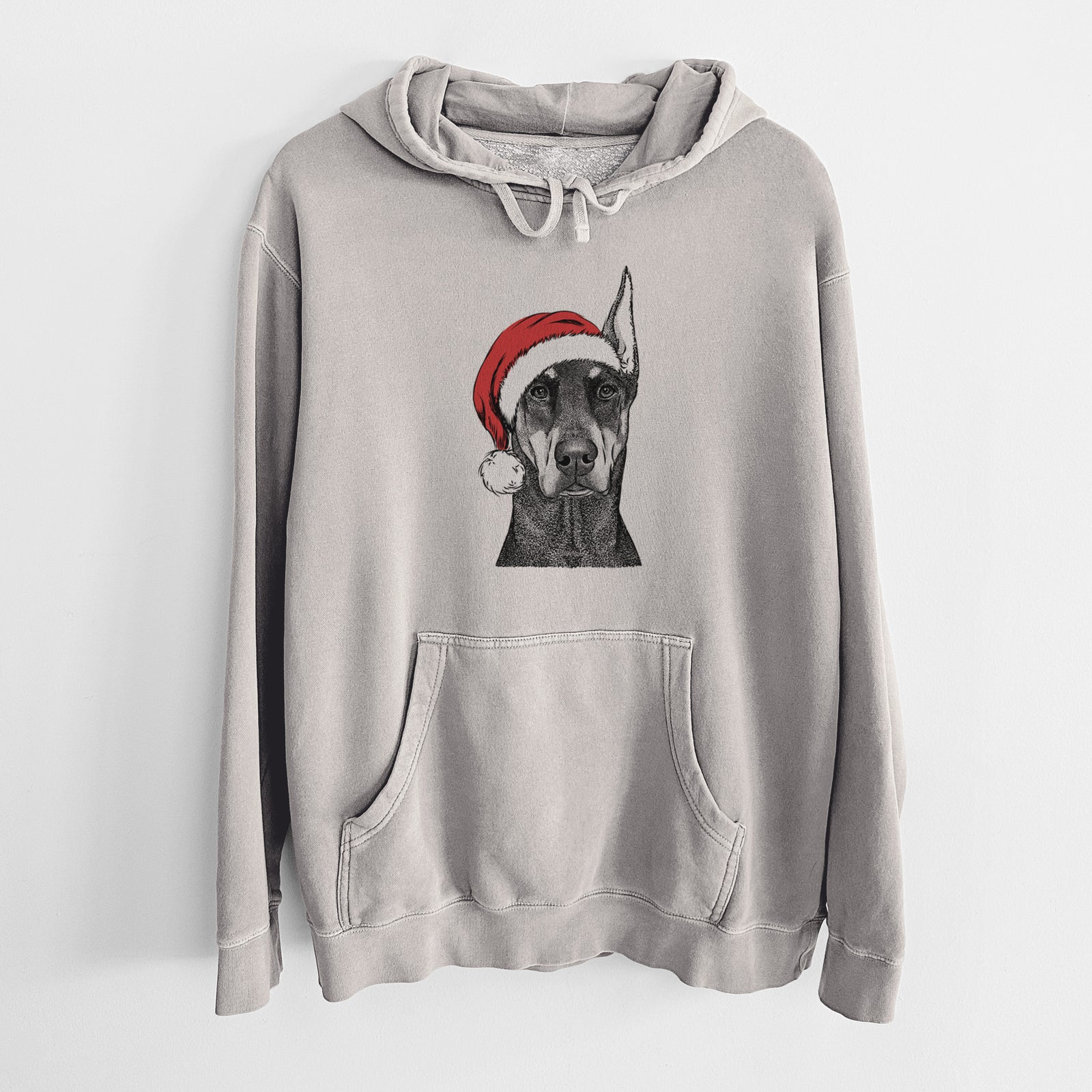 Hand-drawn sketch of Drake the Doberman Pinscher wearing a Santa hat on a Cement Unisex pigment dyed hoodie