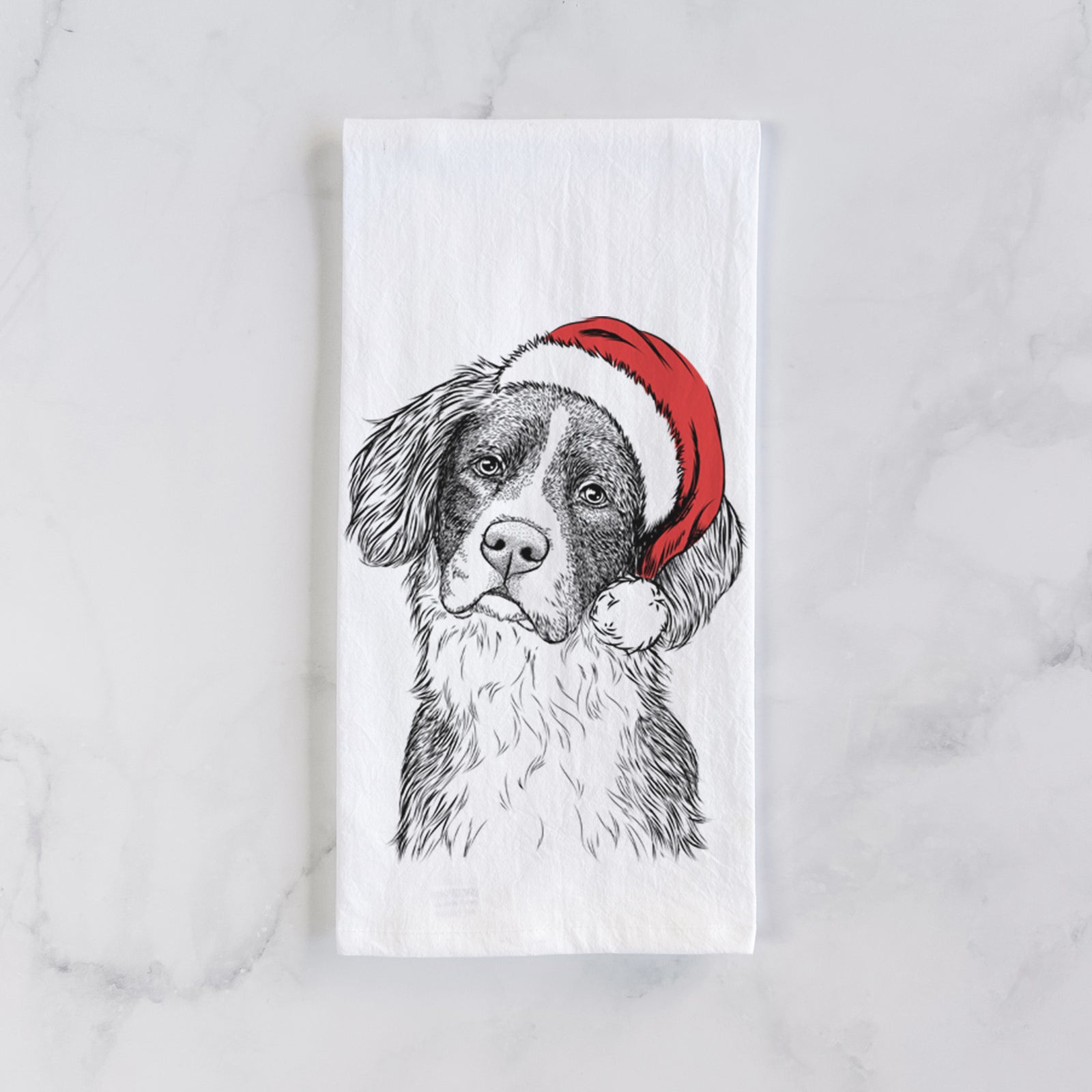 Hand-drawn sketch of Dulce the Drentsche Patrijshond wearing a Santa hat on a tea towel