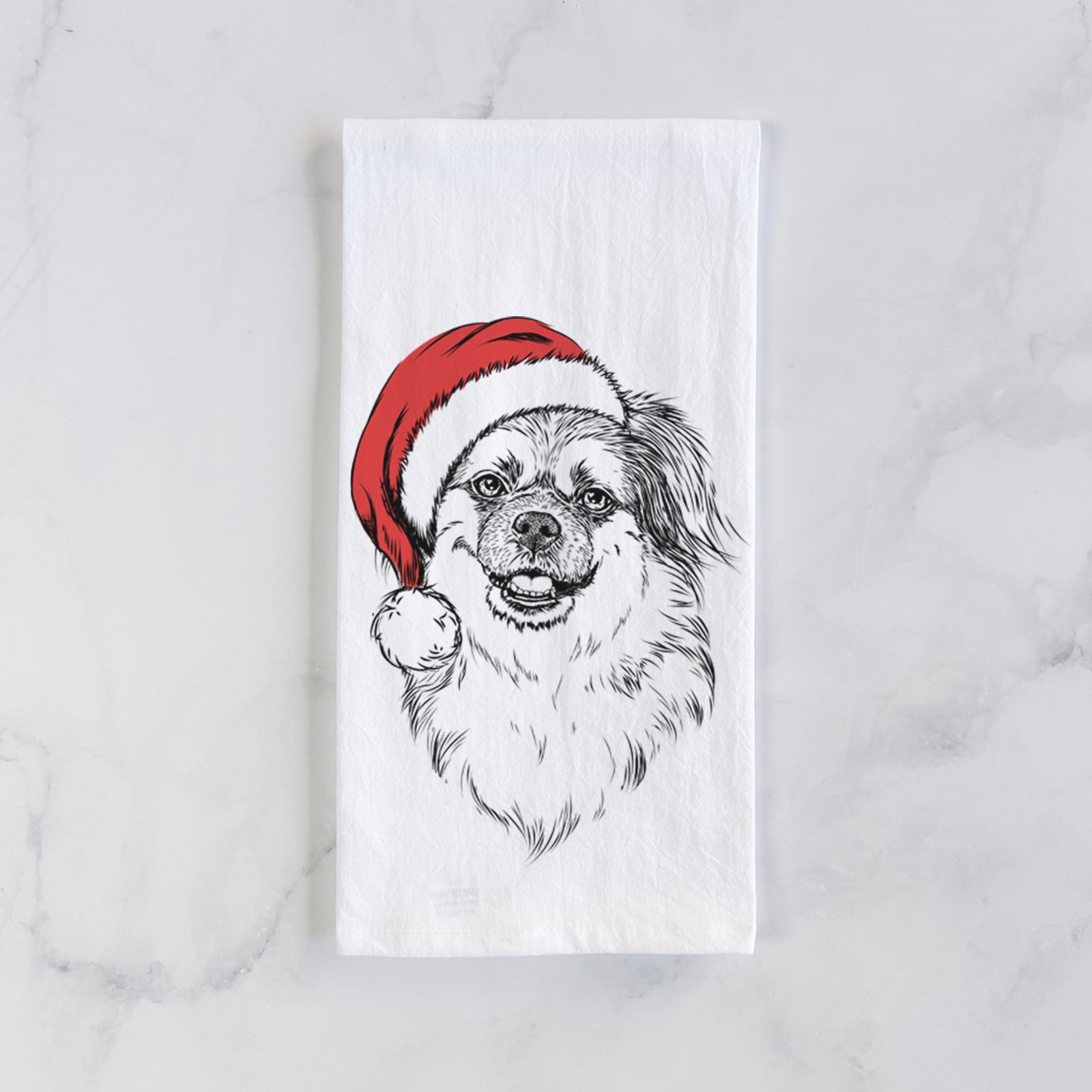 Hand-drawn sketch of Ed the Tibetan Spaniel wearing a Santa hat on a tea towel
