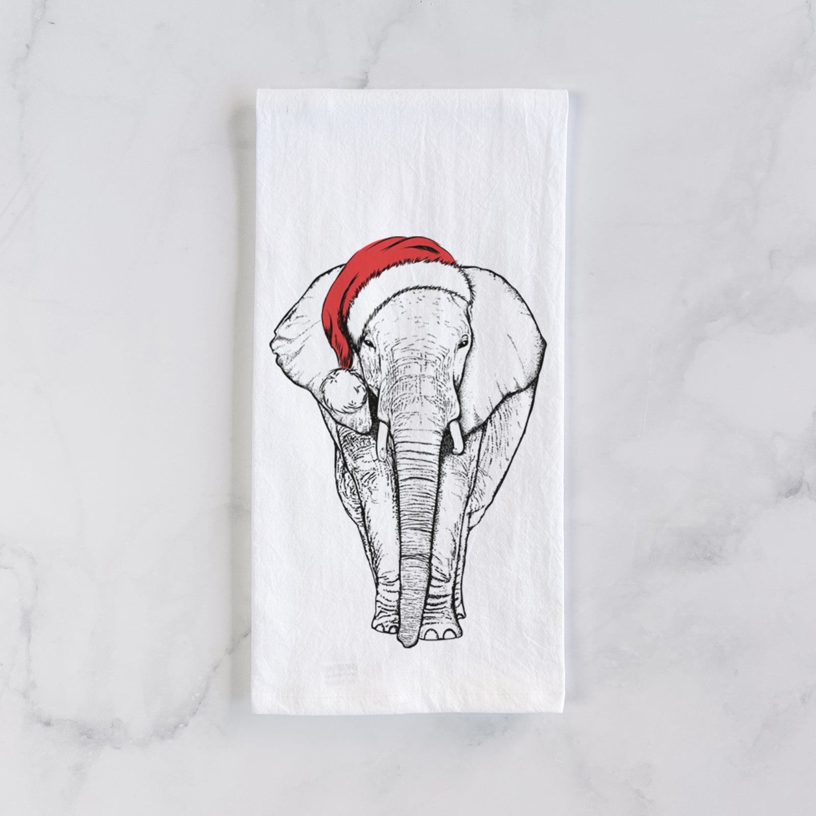 Hand-drawn sketch of Ella the Elephant wearing a Santa hat on a tea towel