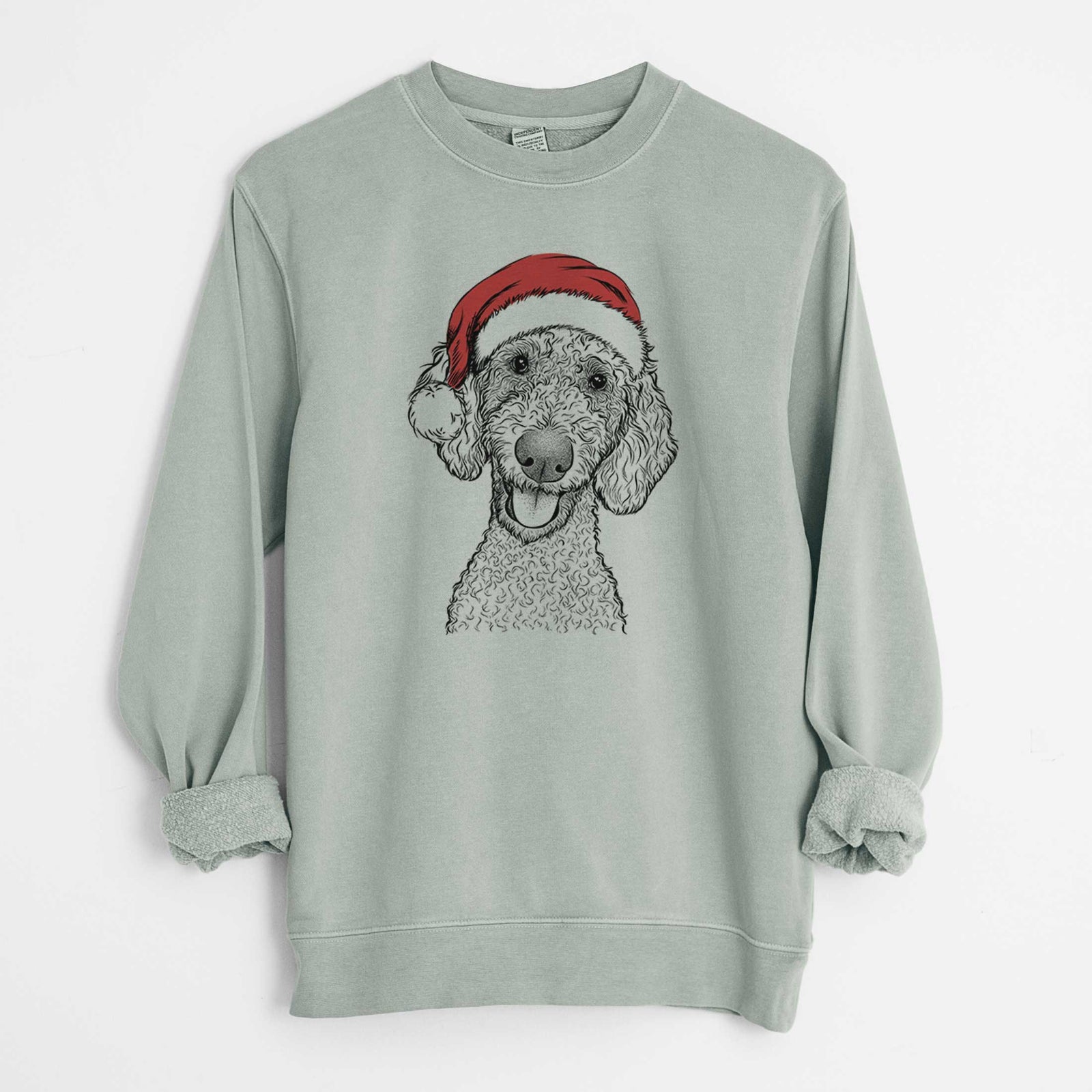 Hand-drawn sketch of Fenway the Goldendoodle wearing a Santa hat on a Sage Unisex pigment dyed crew sweatshirt