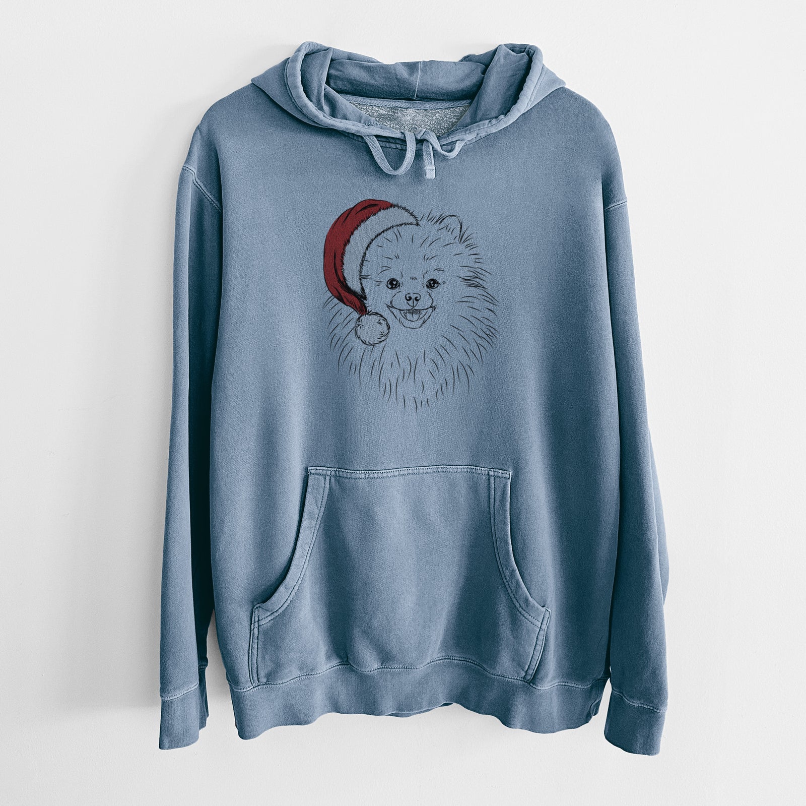 Hand-drawn sketch of Finn the Pomeranian wearing a Santa hat on a Slate Blue Unisex pigment dyed hoodie
