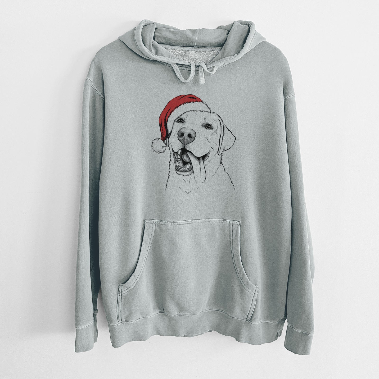 Hand-drawn sketch of Finn the Labrador Retriever wearing a Santa hat on a Sage Unisex pigment dyed hoodie