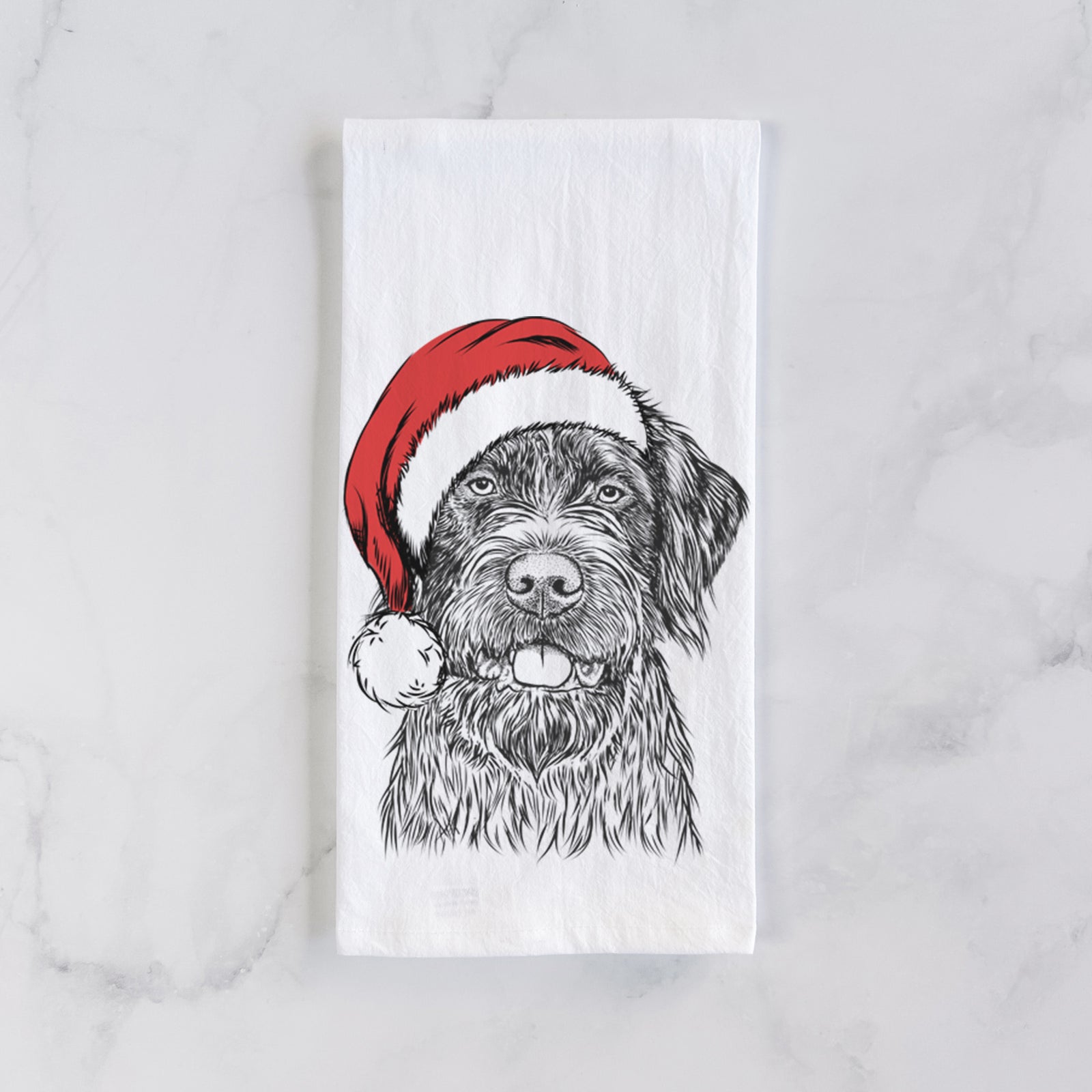 Hand-drawn sketch of Fletcher the Wirehaired Pointing Griffon wearing a Santa hat on a tea towel