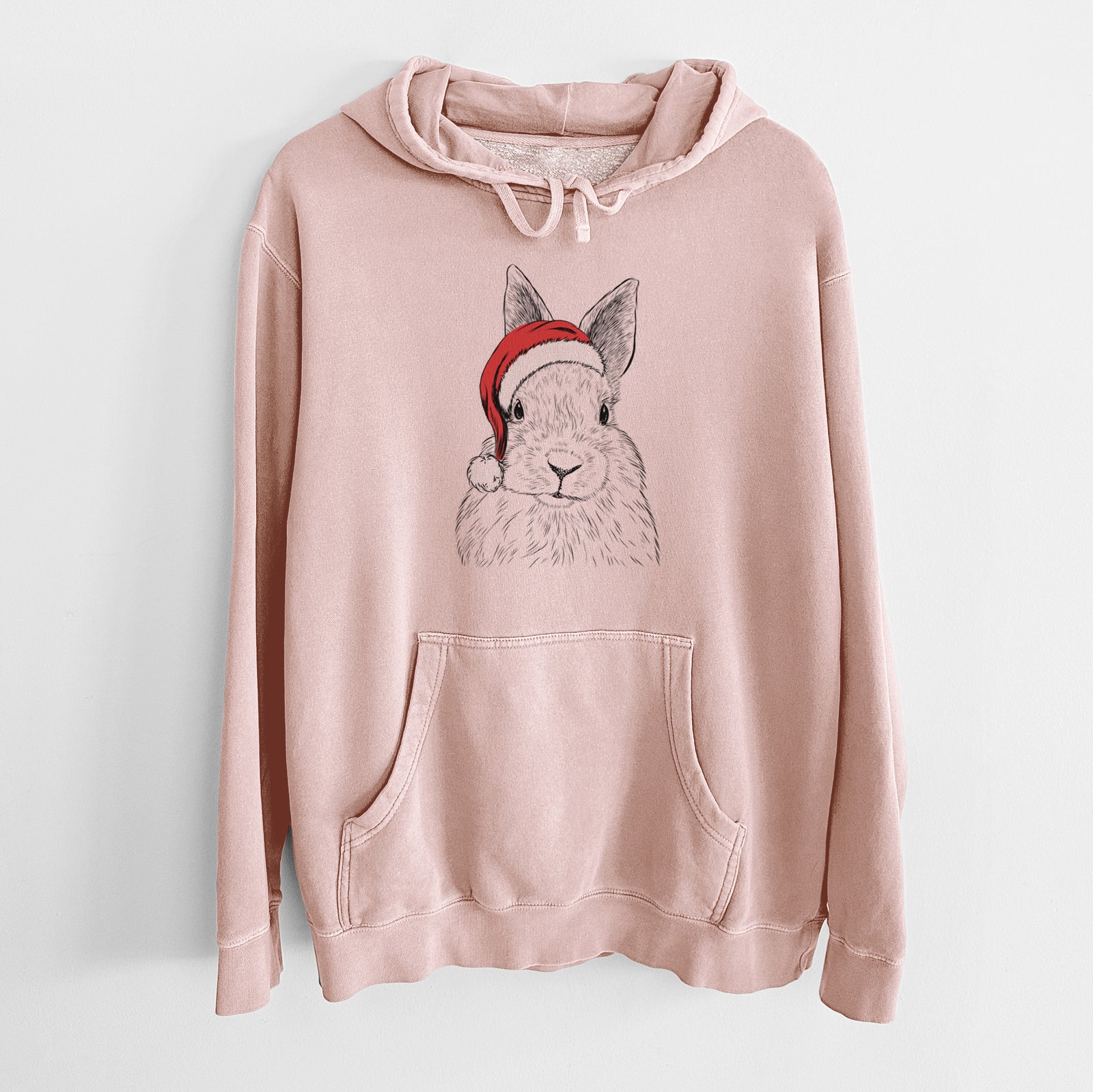 Hand-drawn sketch of Flower the Rex Rabbit wearing a Santa hat on a Dusty Pink Unisex pigment dyed hoodie