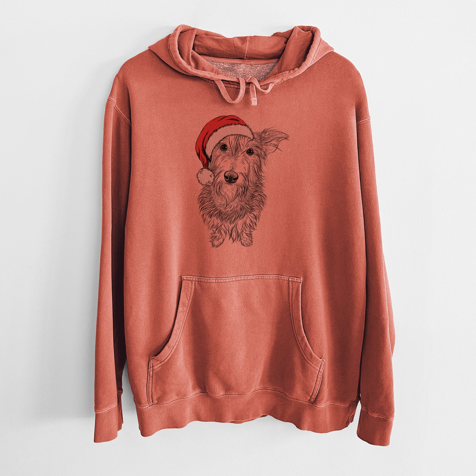 Hand-drawn sketch of Frida Doggo the Rescue Terrier Mix wearing a Santa hat on an Amber Unisex pigment dyed hoodie