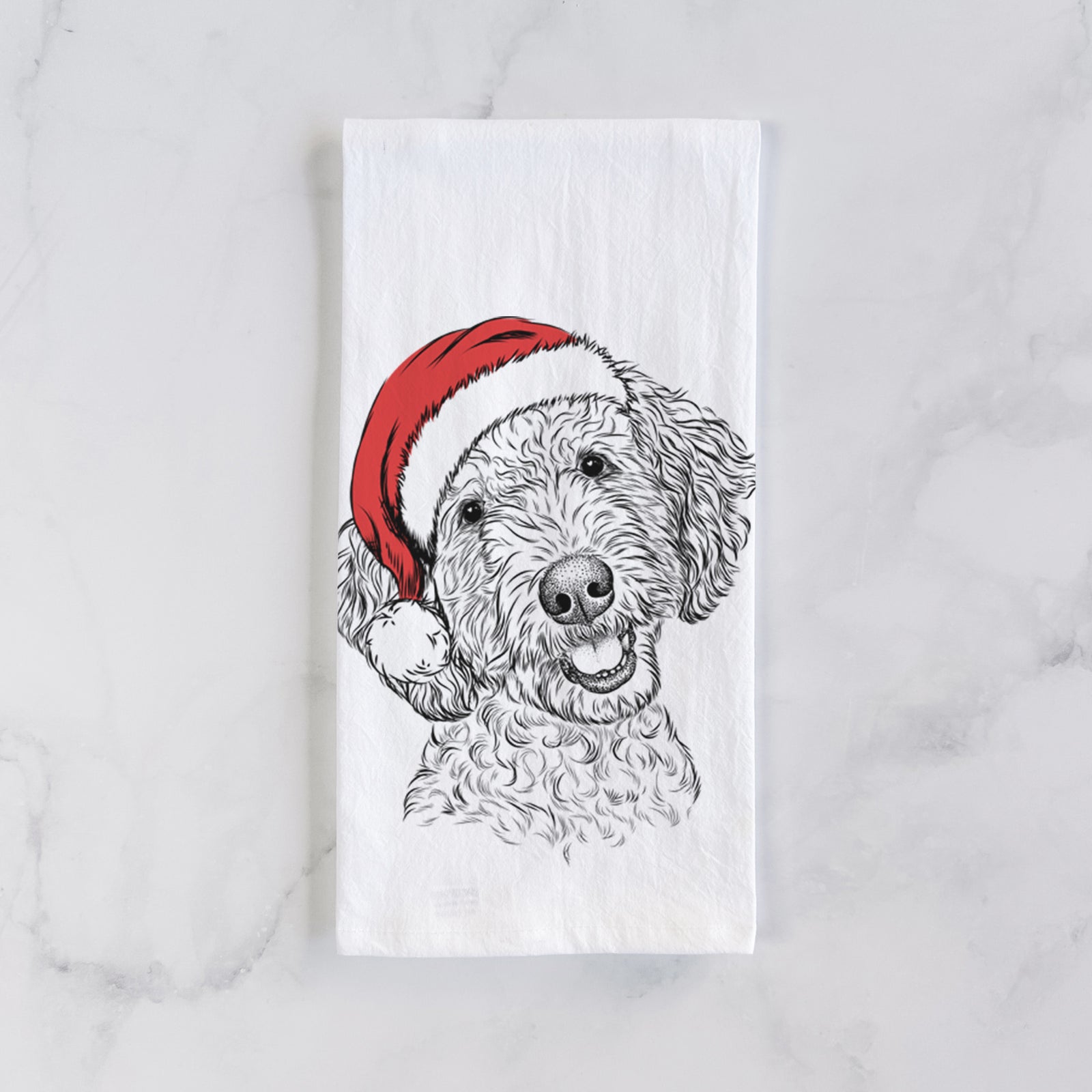 Hand-drawn sketch of Gizmo the Goldendoodle wearing a Santa hat on a tea towel
