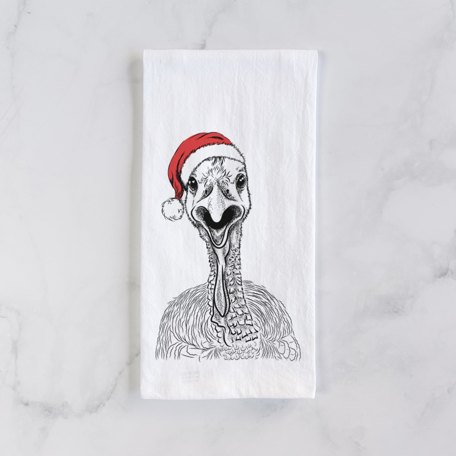 Hand-drawn sketch of Gobble the Turkey wearing a Santa hat on a tea towel