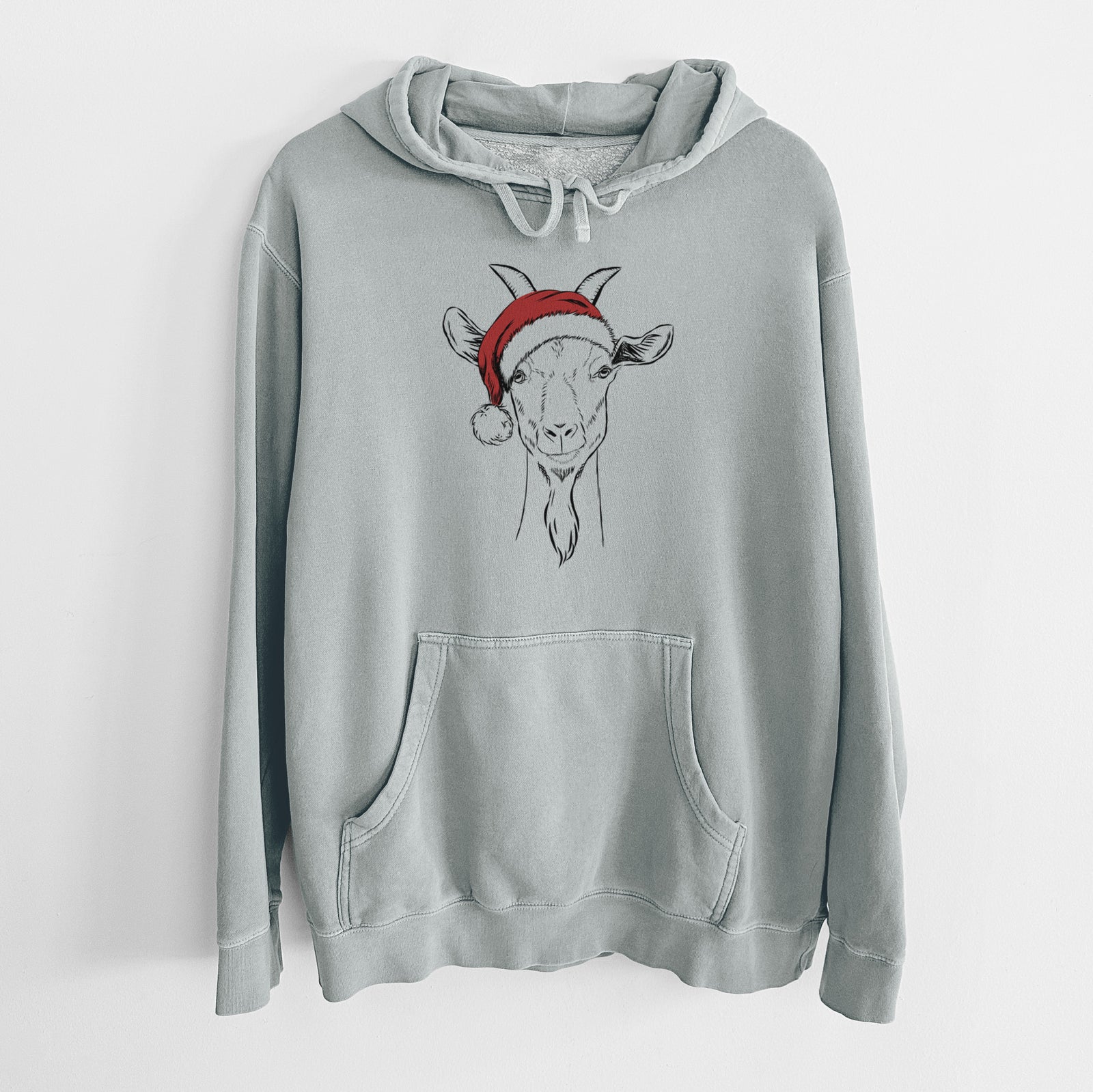 Hand-drawn sketch of Gunnar the Goat wearing a Santa hat on a Sage Unisex pigment dyed hoodie