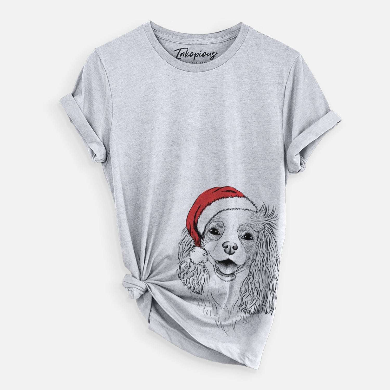 Hand-drawn sketch of Halley Comet the Cavalier King Charles Spaniel wearing a Santa hat on a Grey Unisex crewneck, worn by a woman