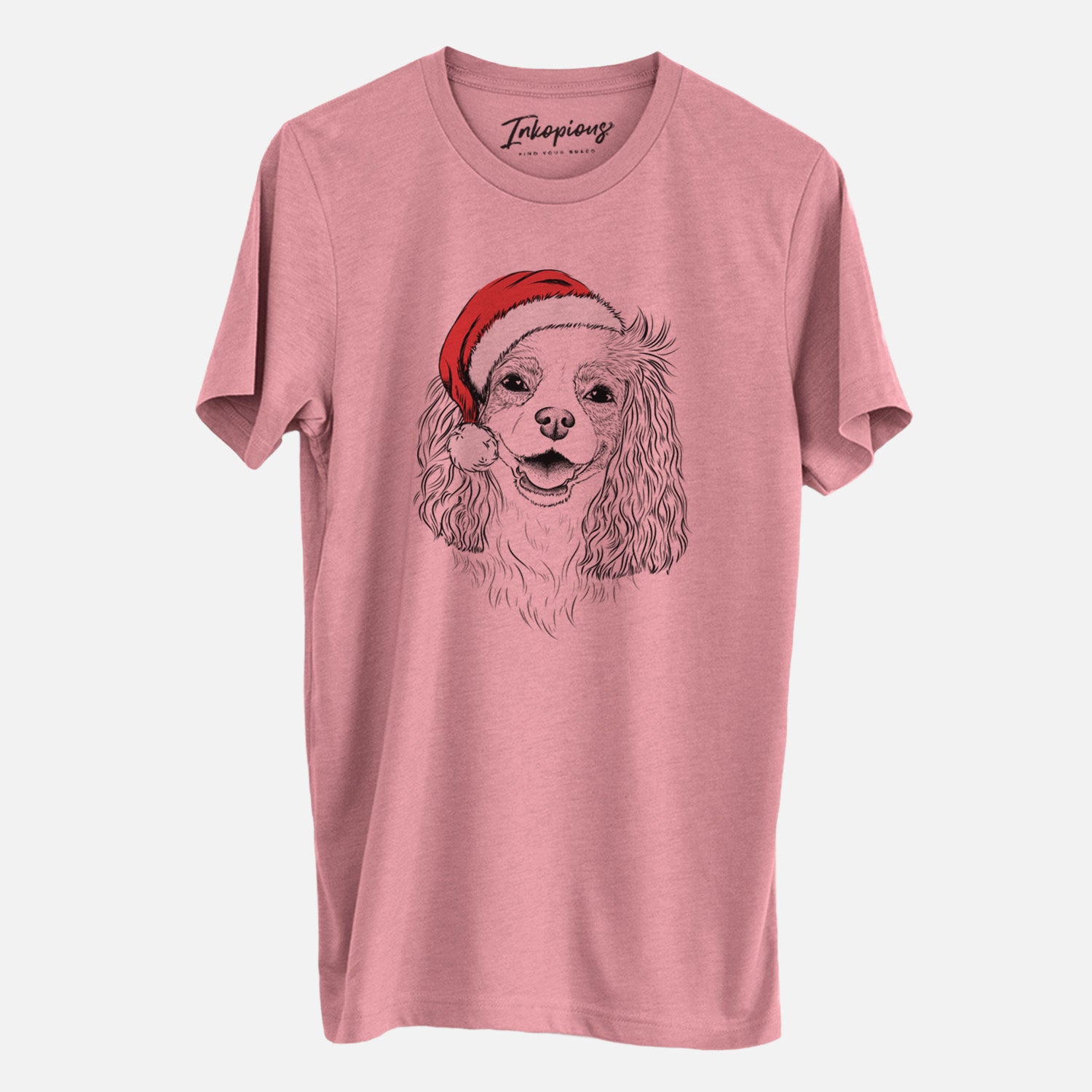 Hand-drawn sketch of Halley Comet the Cavalier King Charles Spaniel wearing a Santa hat on a Mauve Unisex crewneck, worn by a man
